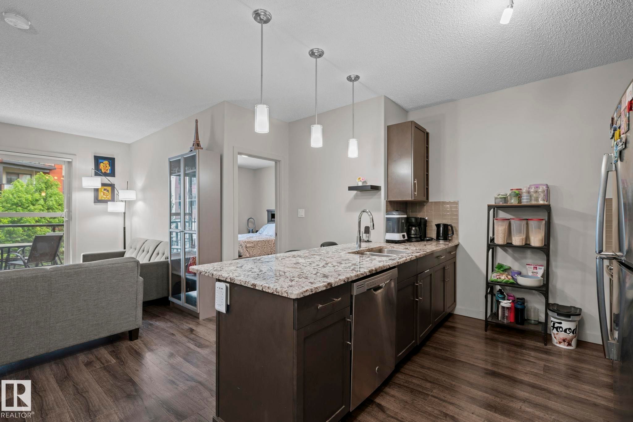 #207 320 Ambleside Li Sw, Edmonton, AB - Indoor Photo Showing Kitchen With Double Sink
