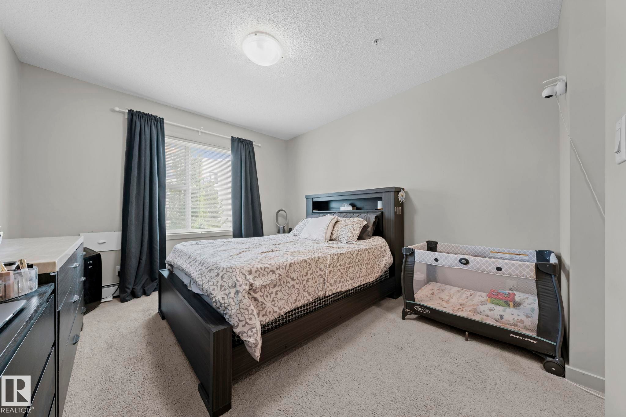 #207 320 Ambleside Li Sw, Edmonton, AB - Indoor Photo Showing Bedroom