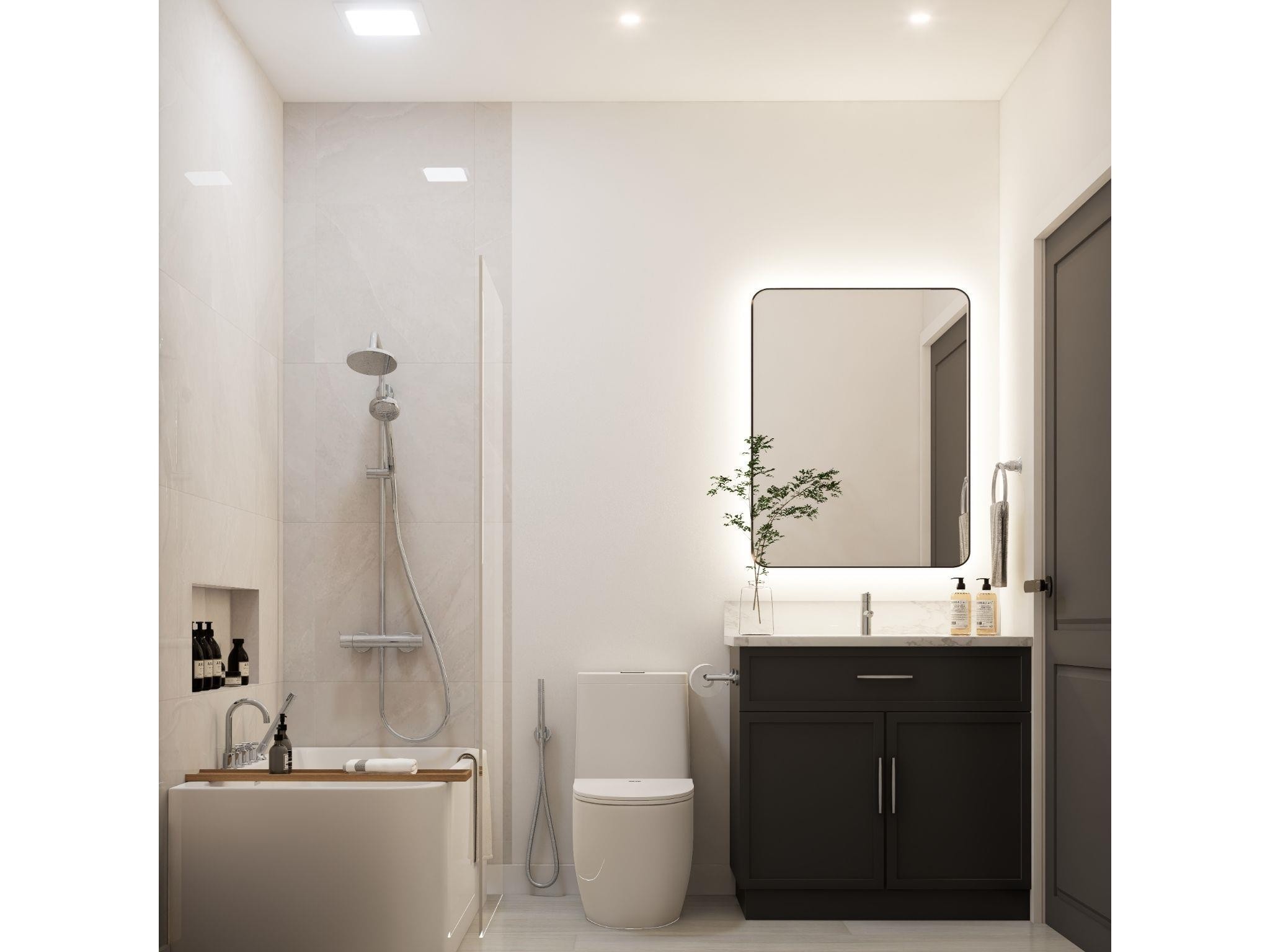 Bathroom featuring a dark wood-finish vanity with a light-colored countertop, an illuminated rectangular mirror, and a built-in shower/tub combination with a wall-mounted showerhead and separate handheld sprayer - 10919 106 Ave, Westlock, AB