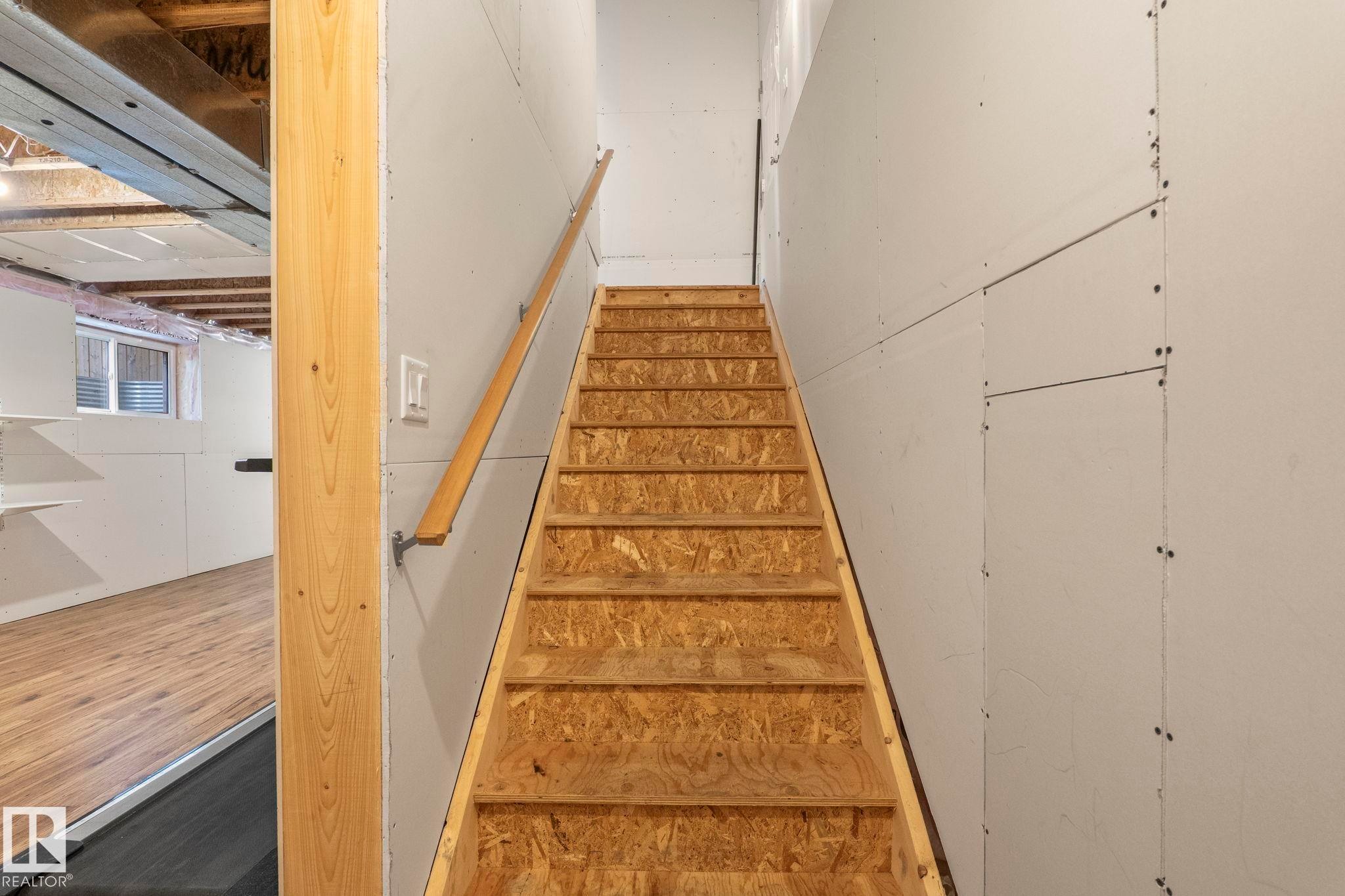 Stairs - 6927 Cardinal Wynd Sw, Edmonton, AB - Indoor Photo Showing Other Room