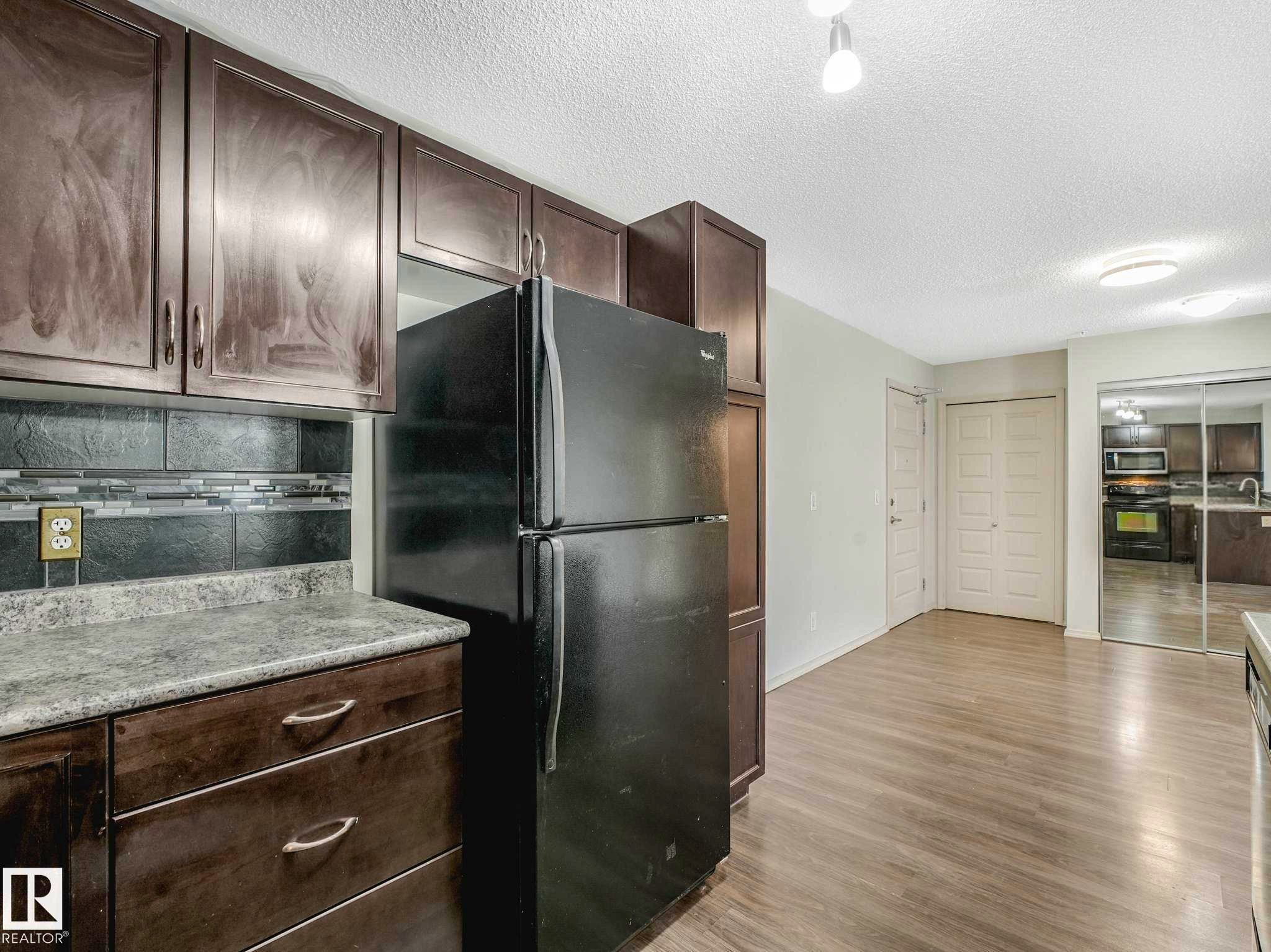 Kitchen - 117 6070 Schonsee Way, Edmonton, AB