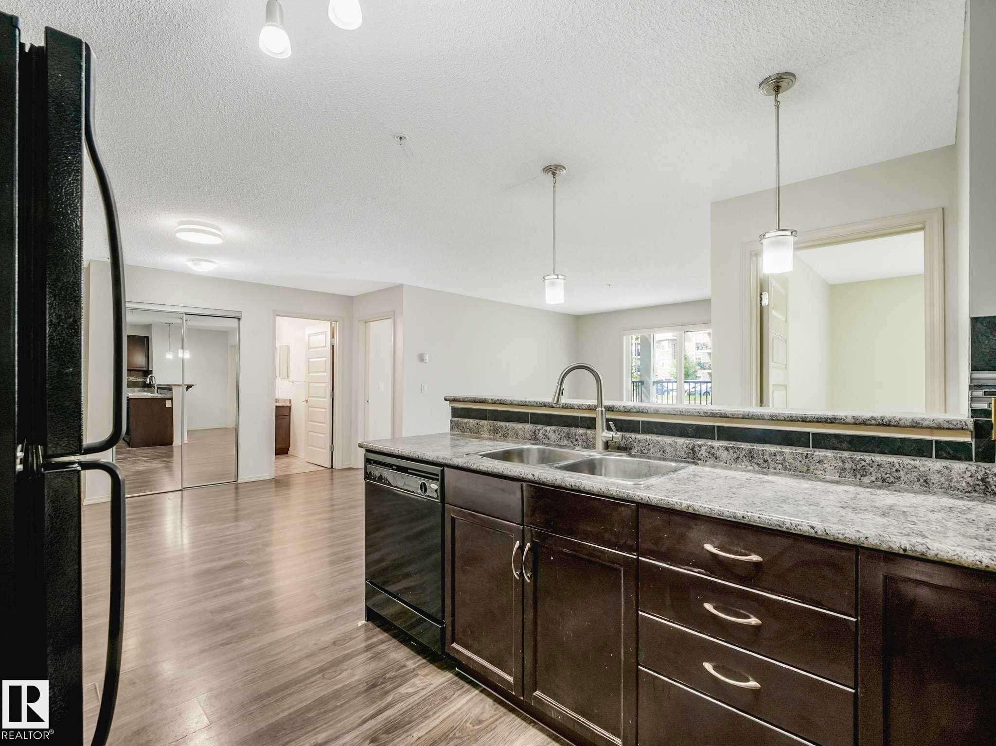 Kitchen - 117 6070 Schonsee Way, Edmonton, AB
