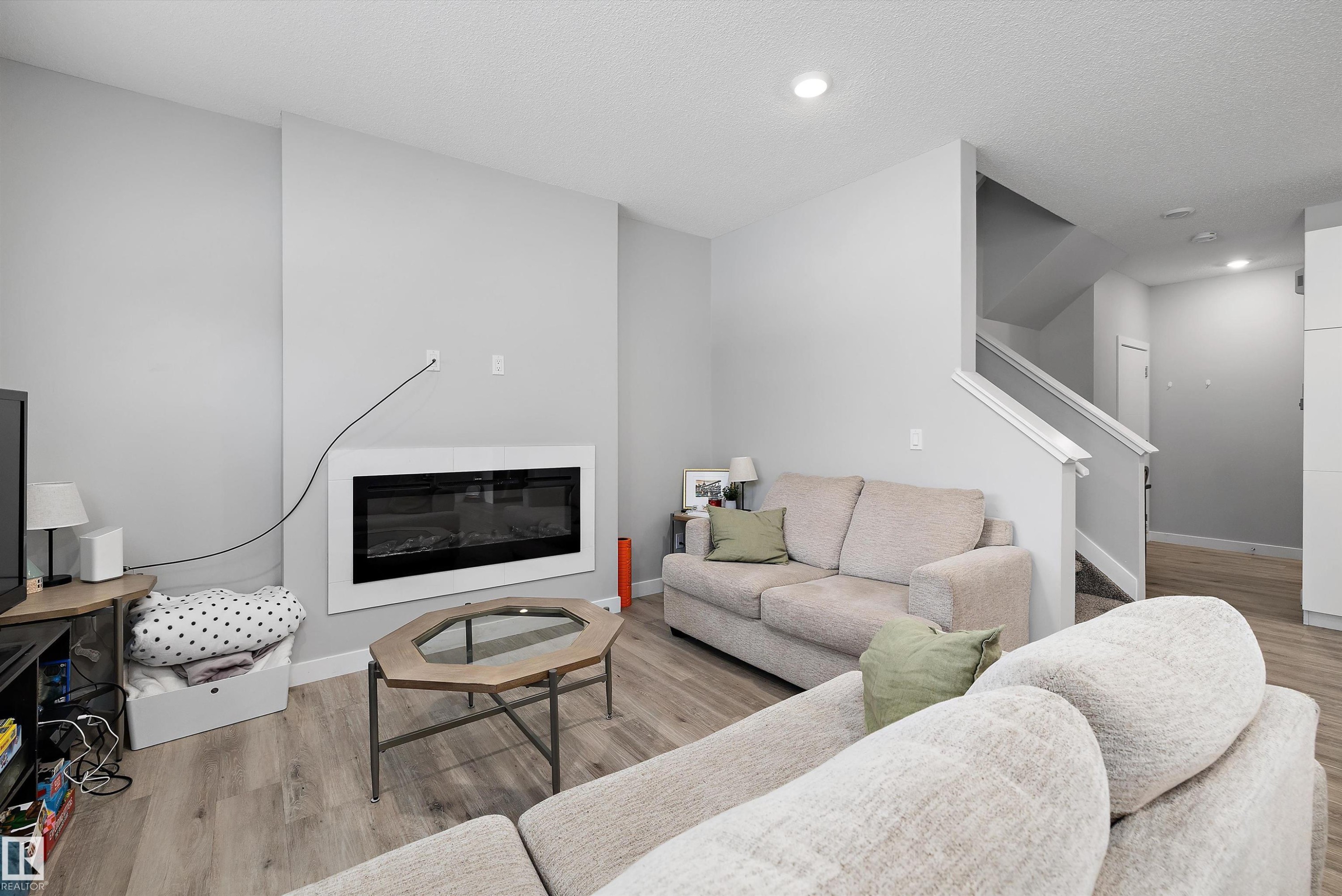 7419 106 Street Nw, Edmonton, AB - Indoor Photo Showing Living Room With Fireplace
