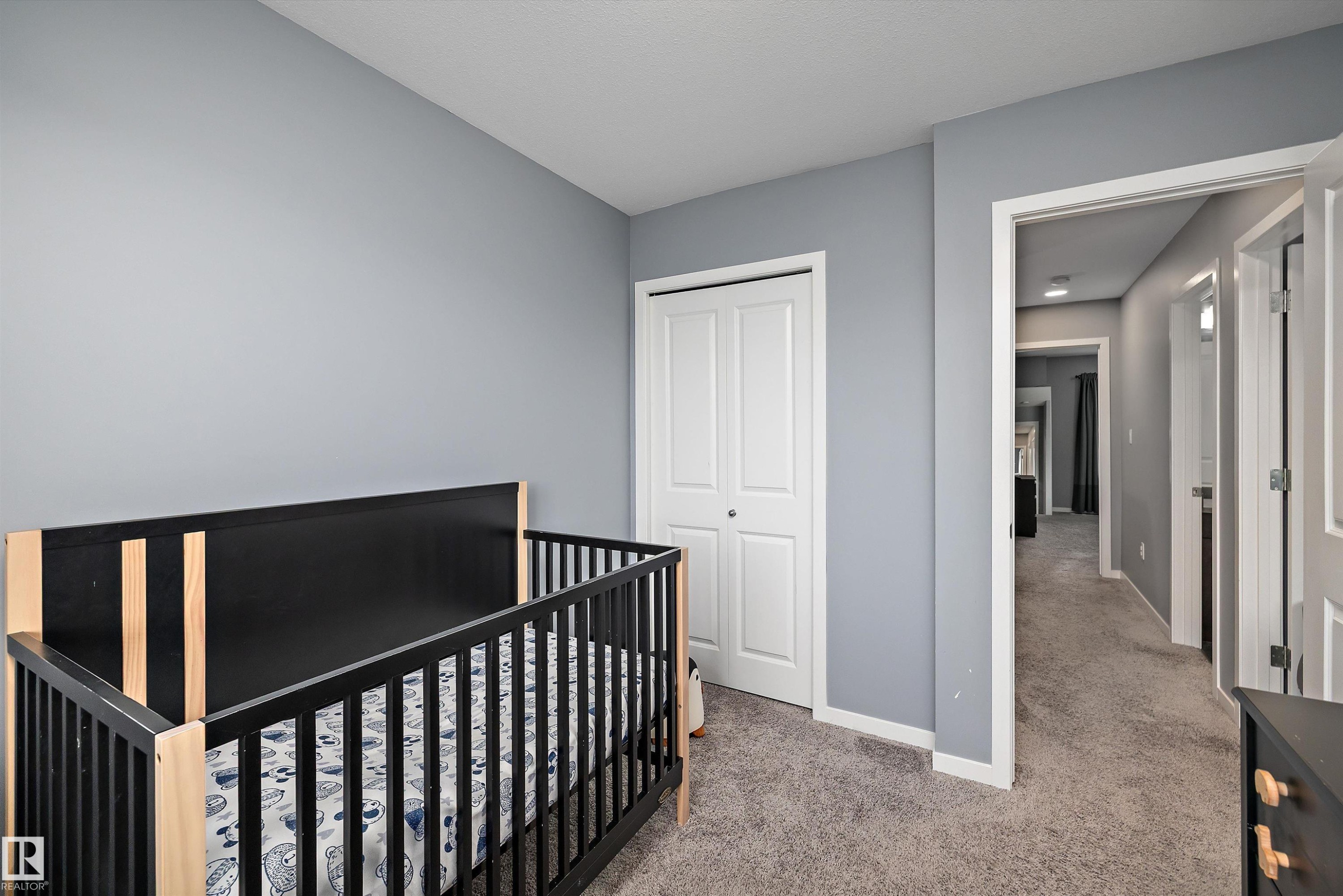 Room featuring light gray painted walls and neutral carpet flooring - 2833 Chokecherry Place, Edmonton, AB