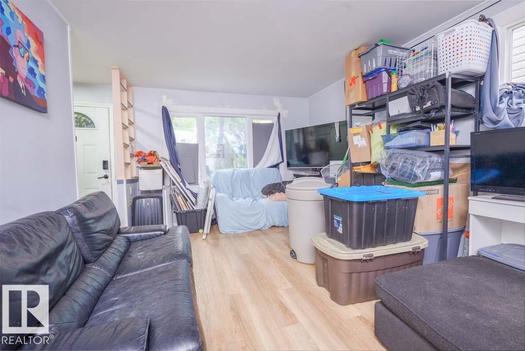 Wood-finish flooring throughout - 11308 94 Street, Edmonton, AB