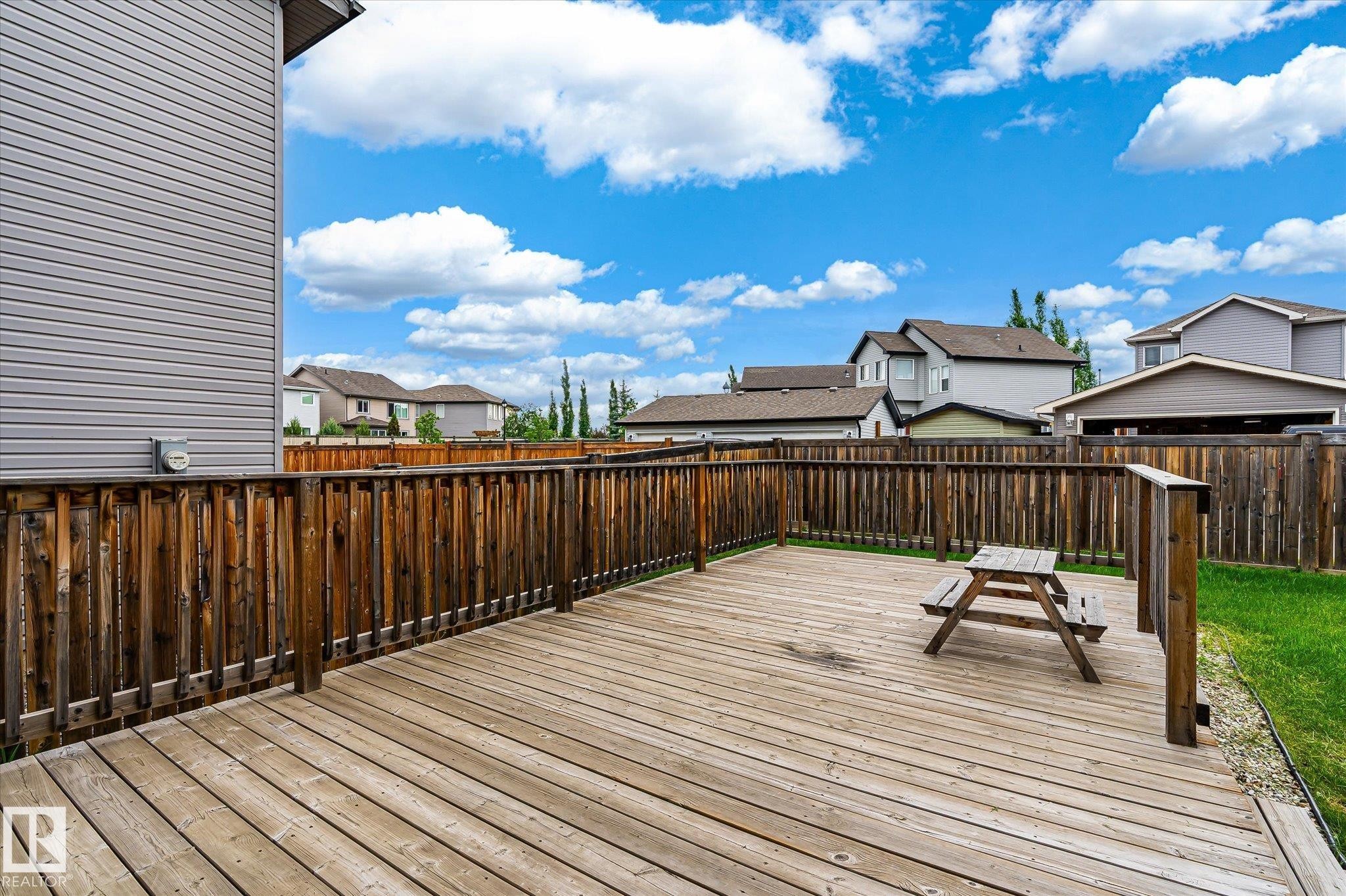 Wood plank decking with a perimeter wood fence - 3685 Westcliff Way, Edmonton, AB