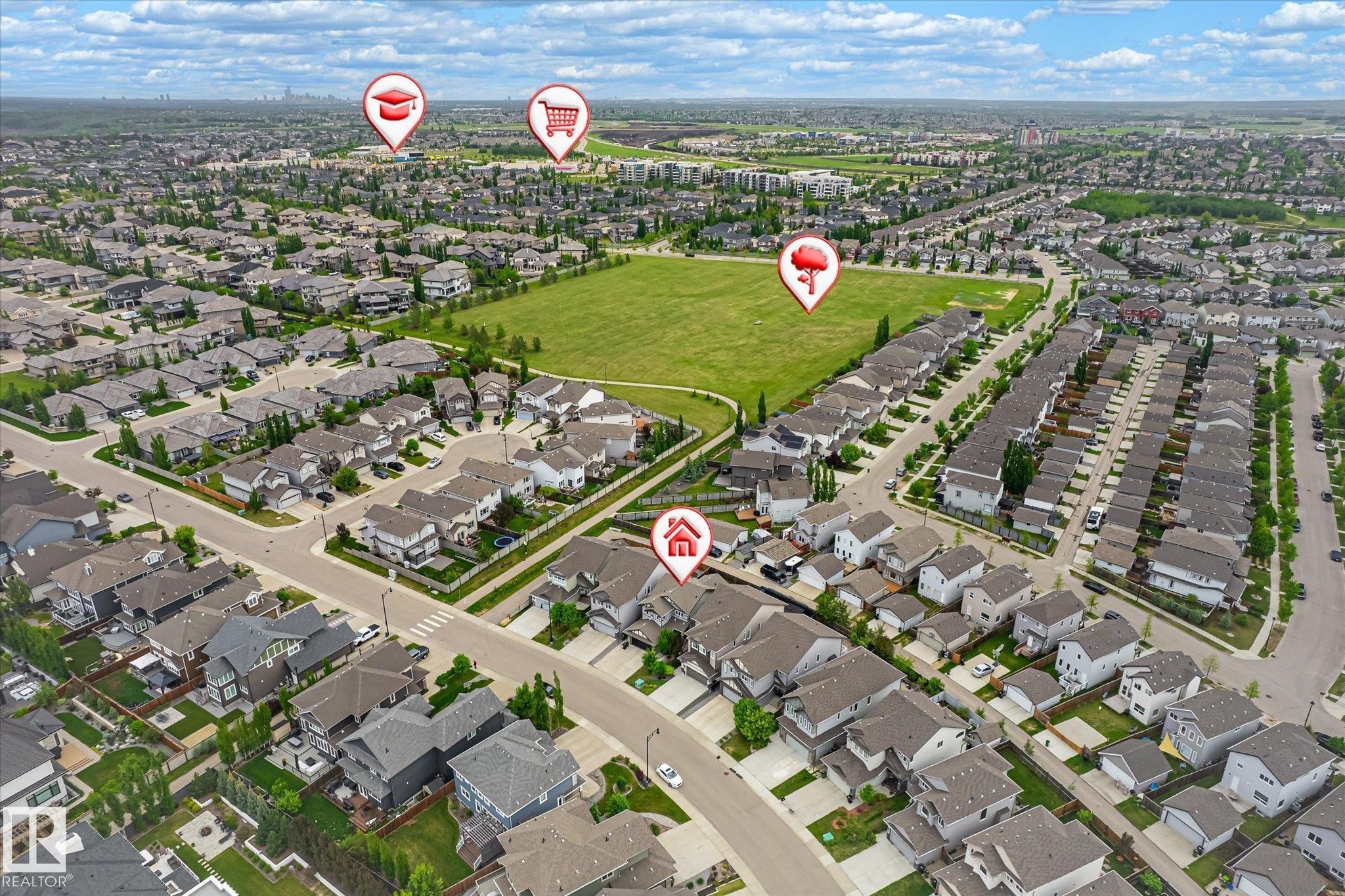 Aerial perspective showcasing a residential development with an expansive green space - 3685 Westcliff Way, Edmonton, AB