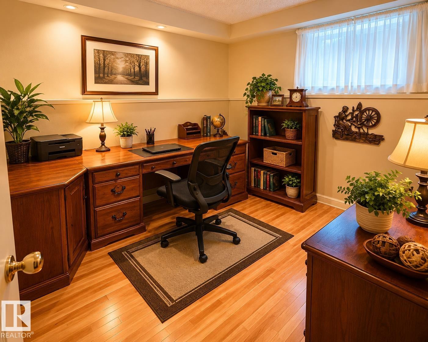Dedicated office space featuring wood-finish flooring - 1 Munro Court, Leduc, AB