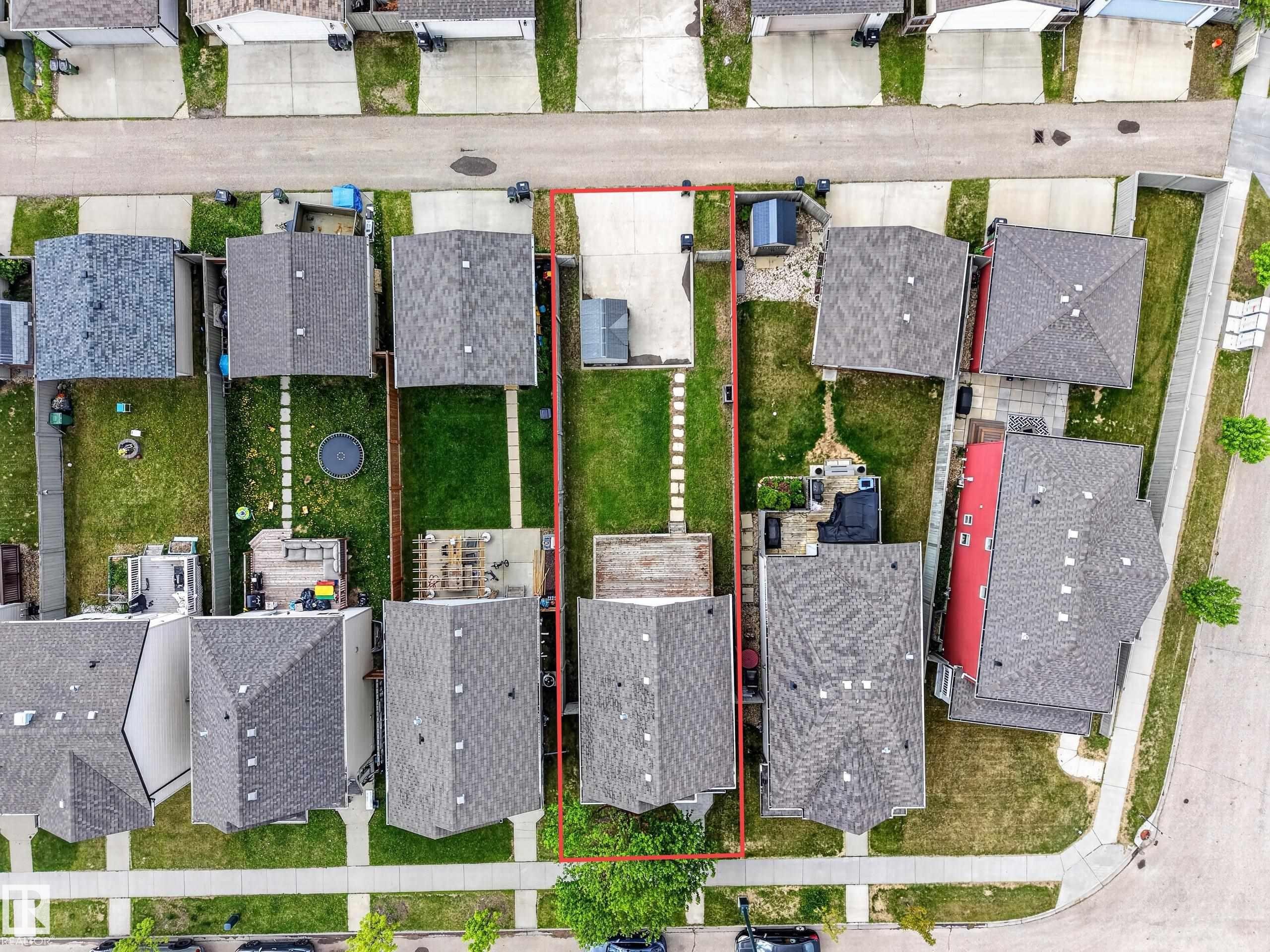 Aerial view showcasing a residential property with a defined lot perimeter - 3634 12 Street, Edmonton, AB