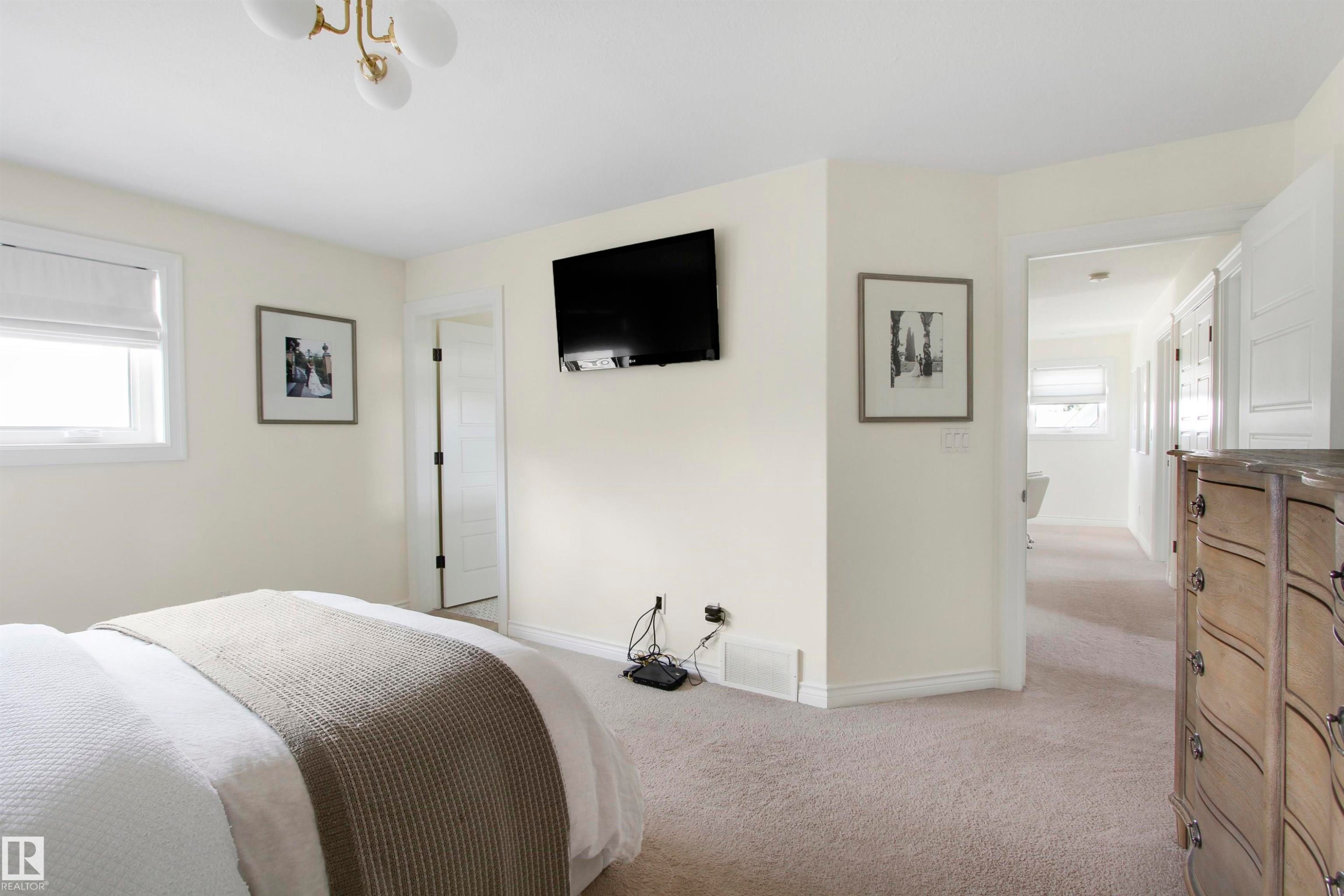 Carpeted room with light-toned walls and a white ceiling - 34 Falcon Road, Cold Lake, AB