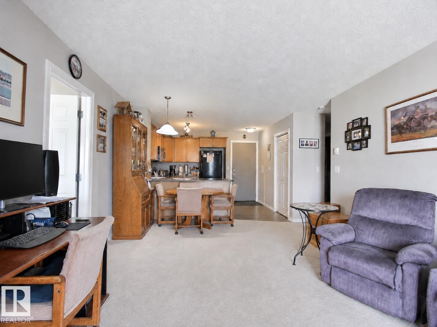 #417 4403 23 St Nw, Edmonton, AB - Indoor Photo Showing Living Room