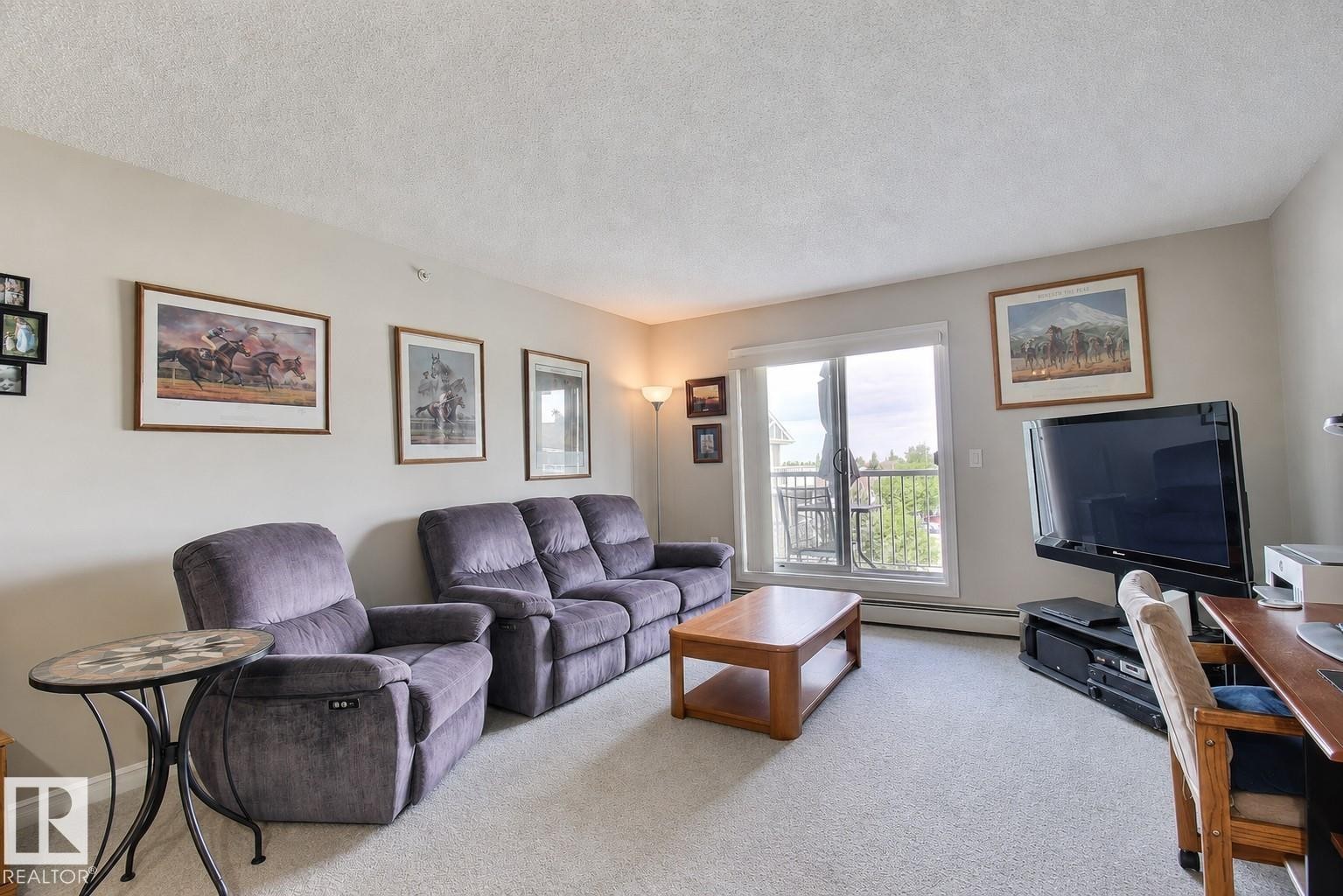 #417 4403 23 St Nw, Edmonton, AB - Indoor Photo Showing Living Room
