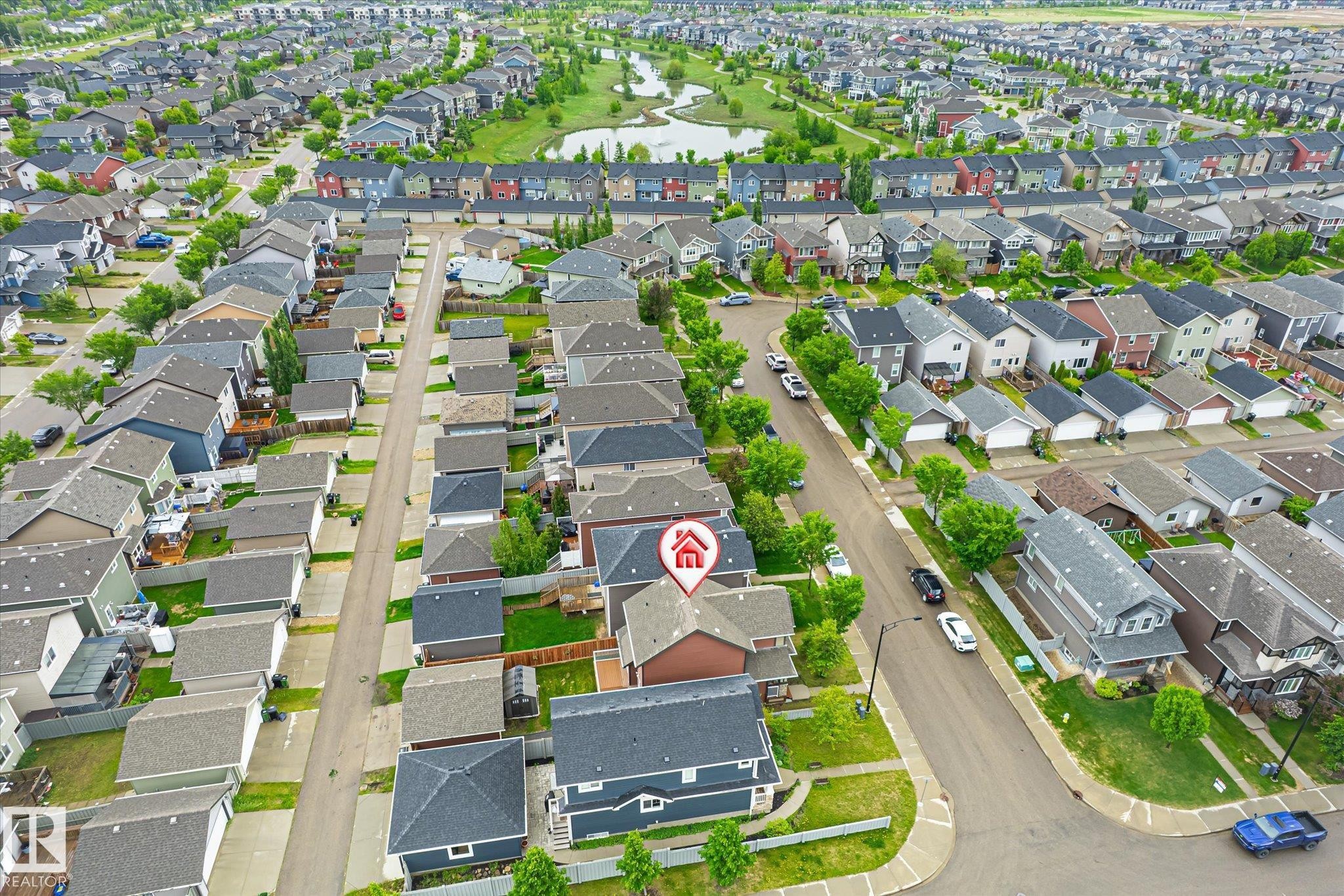 Aerial perspective showcasing the residential neighborhood with varied architectural styles - 9039 219 Street, Edmonton, AB