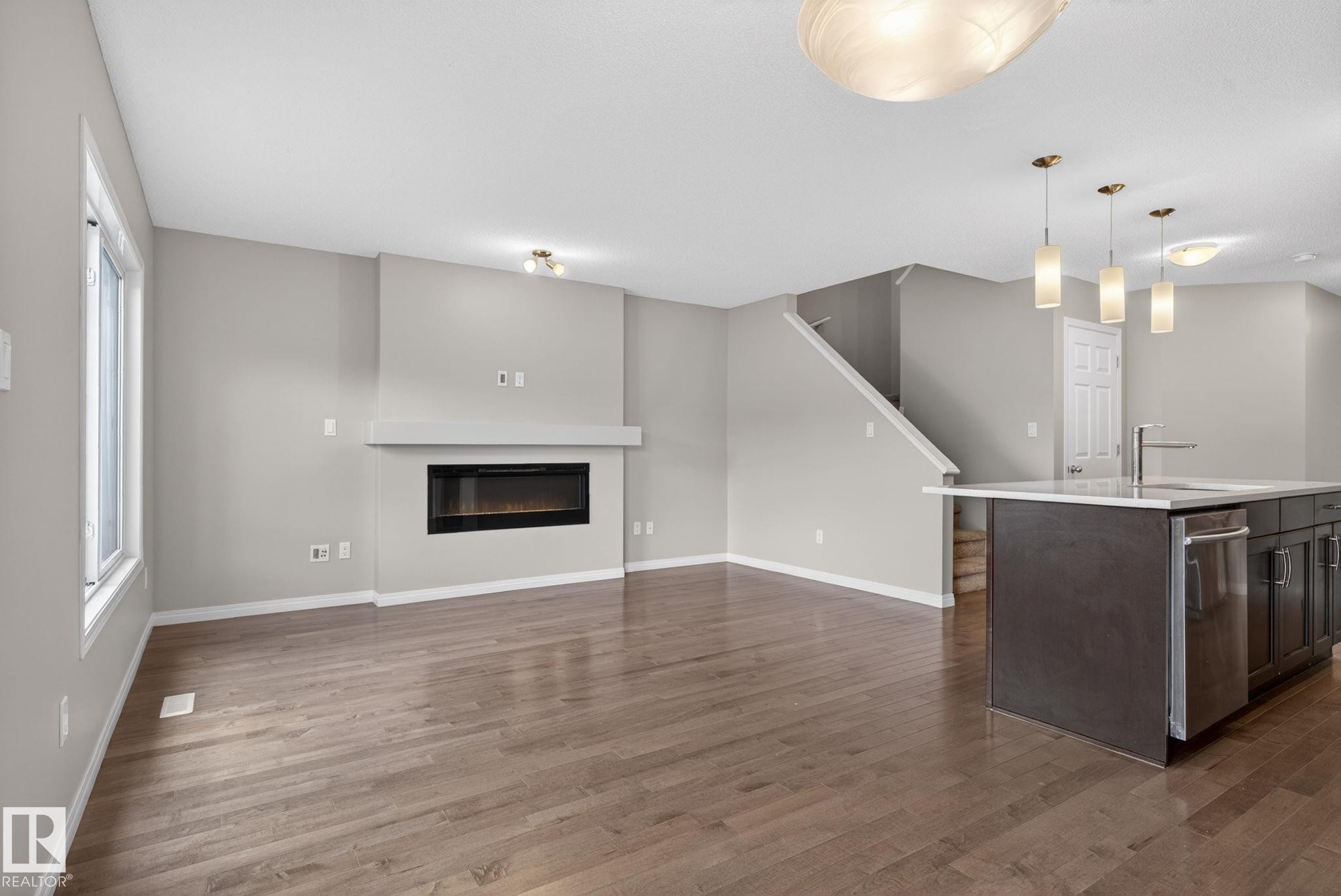 4330 Prowse Link Link Sw, Edmonton, AB - Indoor With Fireplace