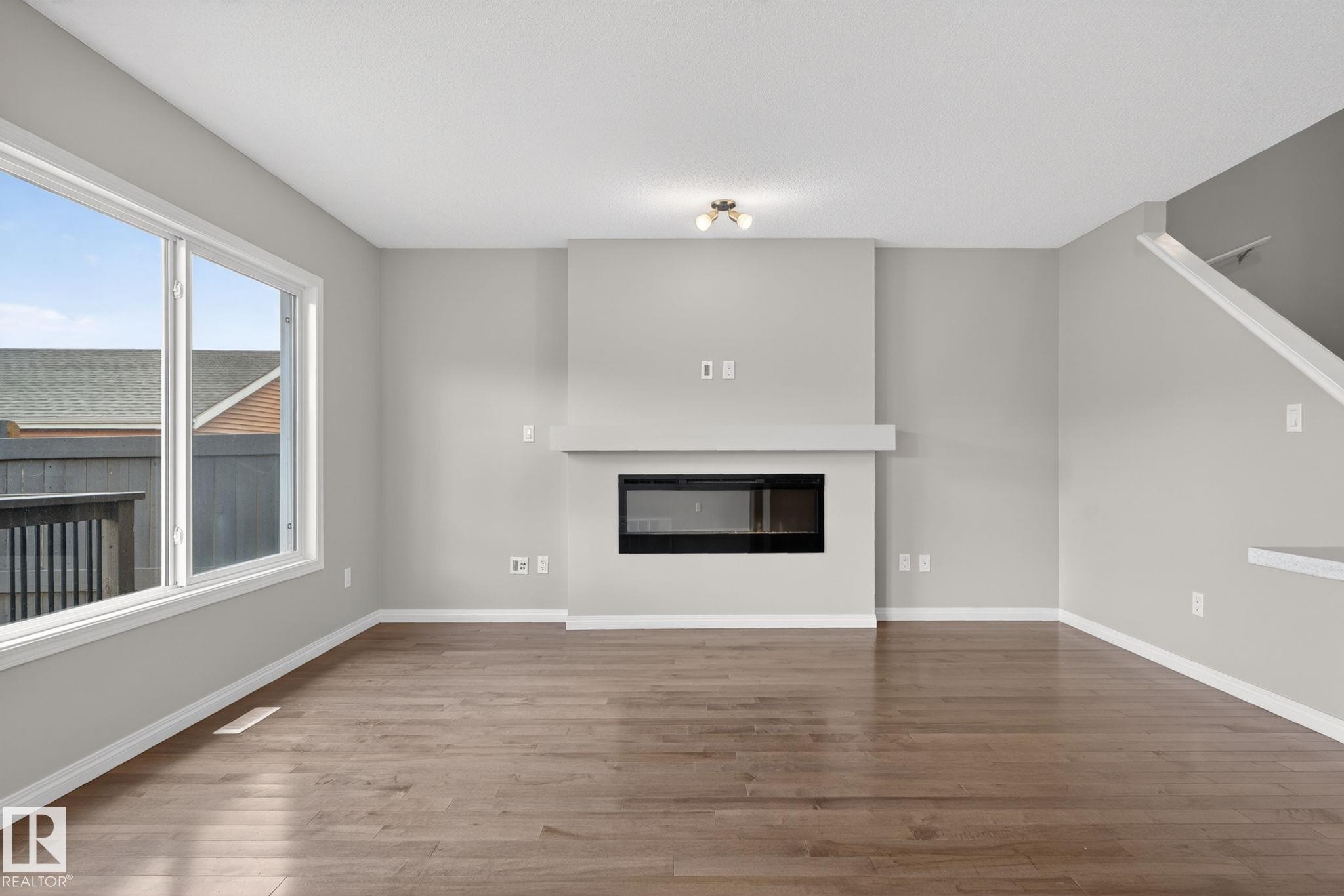 4330 Prowse Link Link Sw, Edmonton, AB - Indoor Photo Showing Living Room With Fireplace