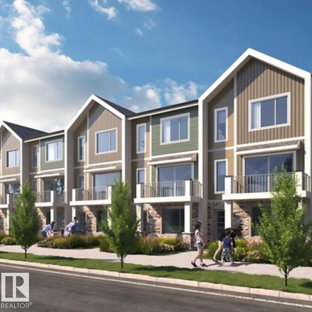 Contemporary townhome exteriors featuring varied siding, stone accents, private balconies, and individual entryways - 6 18110 28 Avenue, Edmonton, AB