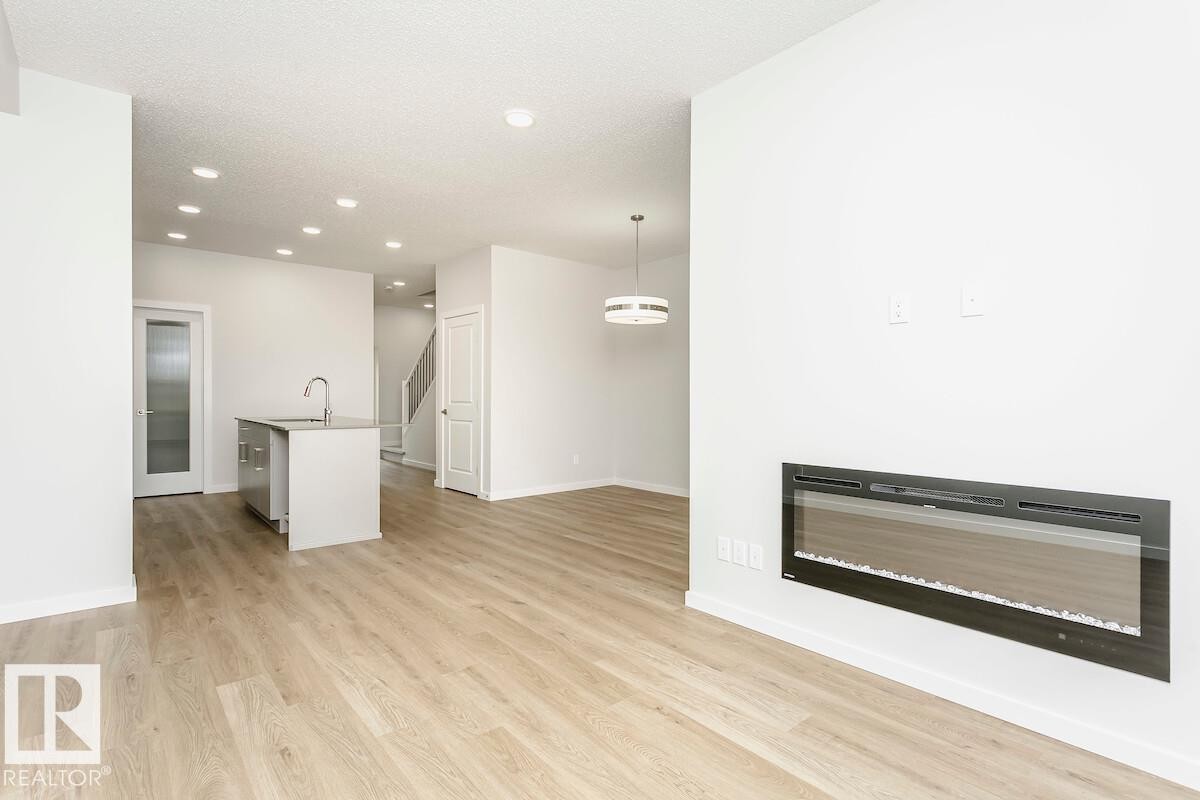 2851 64 Street Sw, Edmonton, AB - Indoor With Fireplace