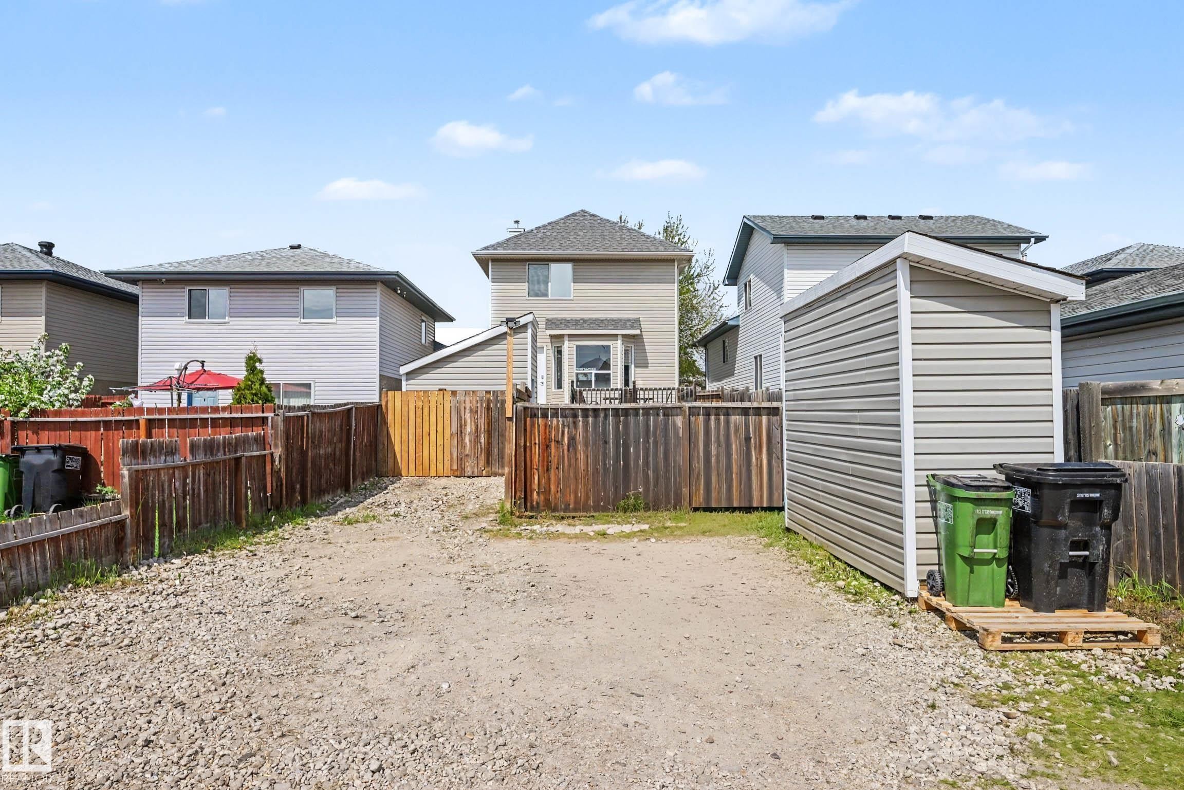 Expansive gravel area offering versatile outdoor space - 2123 36 Avenue, Edmonton, AB - Outdoor With Deck Patio Veranda