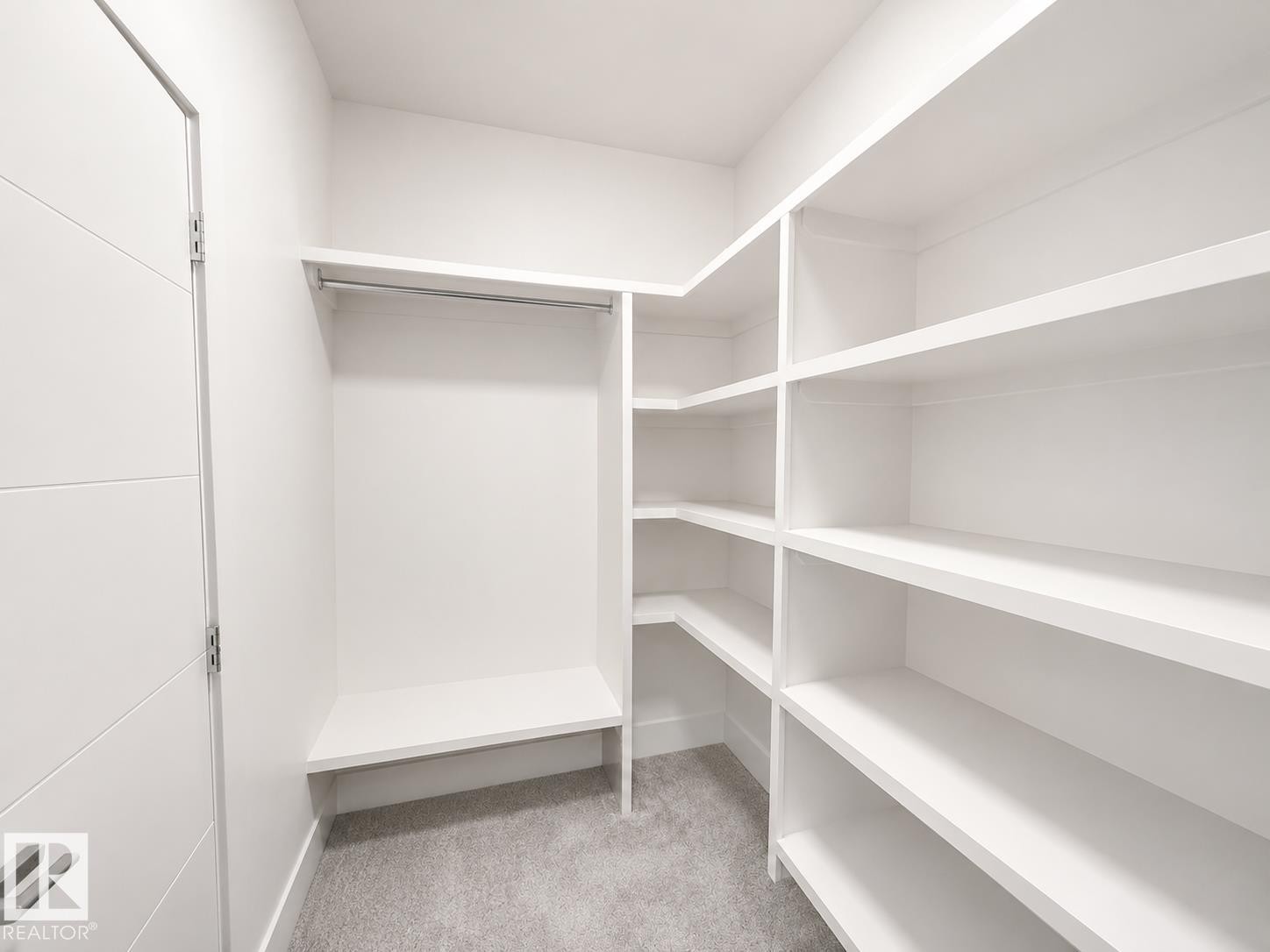 Custom closet system featuring extensive shelving and hanging rods - 415 42 Street, Edmonton, AB