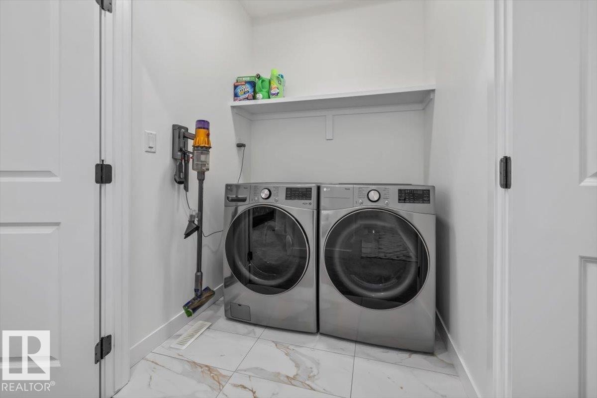 3616 Triomphe Boulevard, Beaumont, AB - Indoor Photo Showing Laundry Room