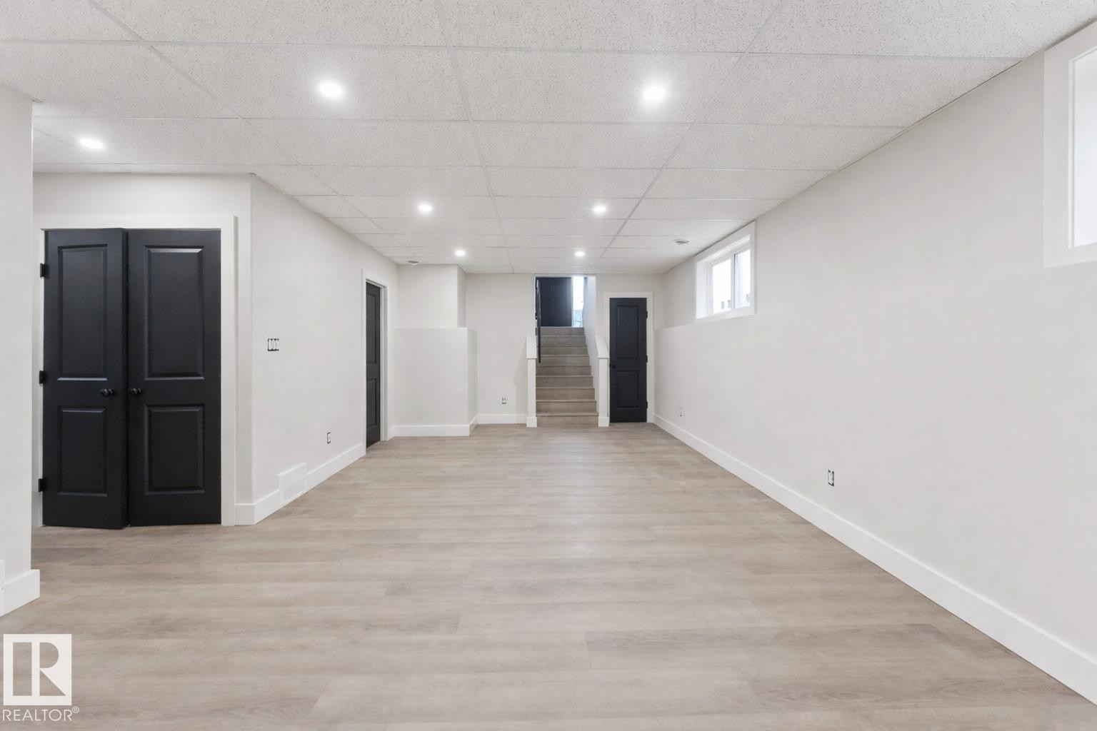 Spacious room featuring light wood-finish flooring and bright white walls - 301 Fundy Way, Cold Lake, AB - Indoor