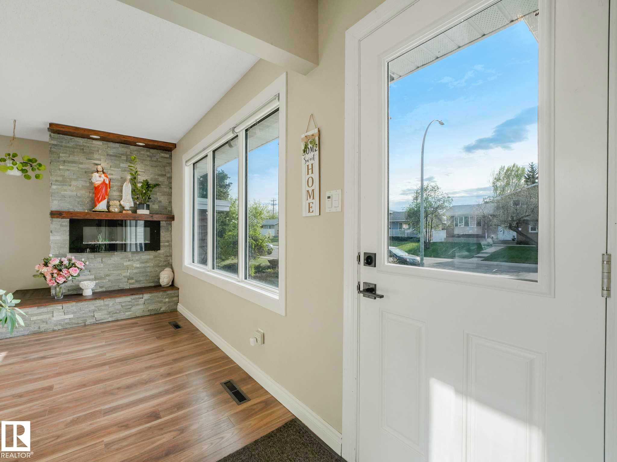 White front door with an integrated window - 9207 169 Street, Edmonton, AB - Indoor Photo Showing Other Room
