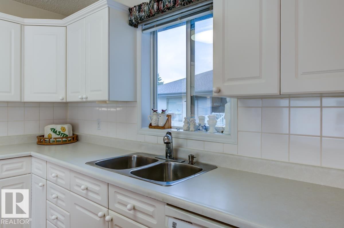 #7 9731 174 St Nw, Edmonton, AB - Indoor Photo Showing Kitchen With Double Sink