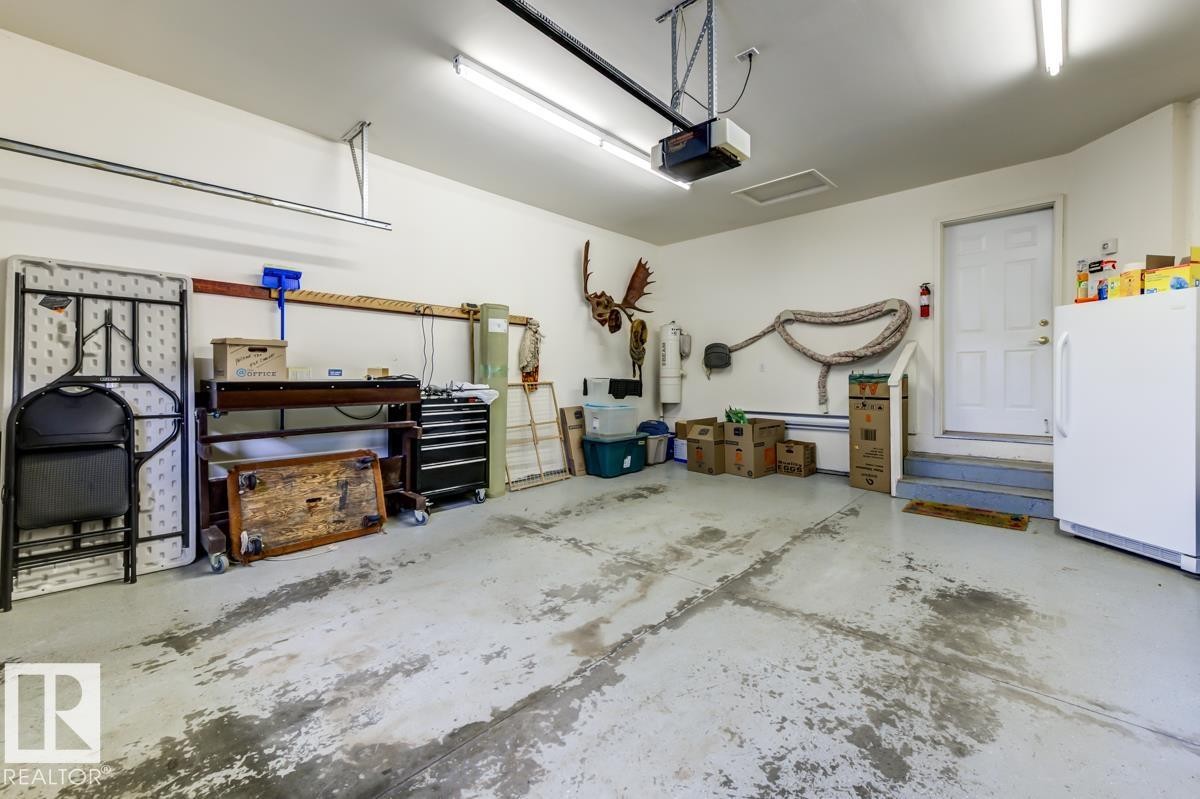 #7 9731 174 St Nw, Edmonton, AB - Indoor Photo Showing Garage
