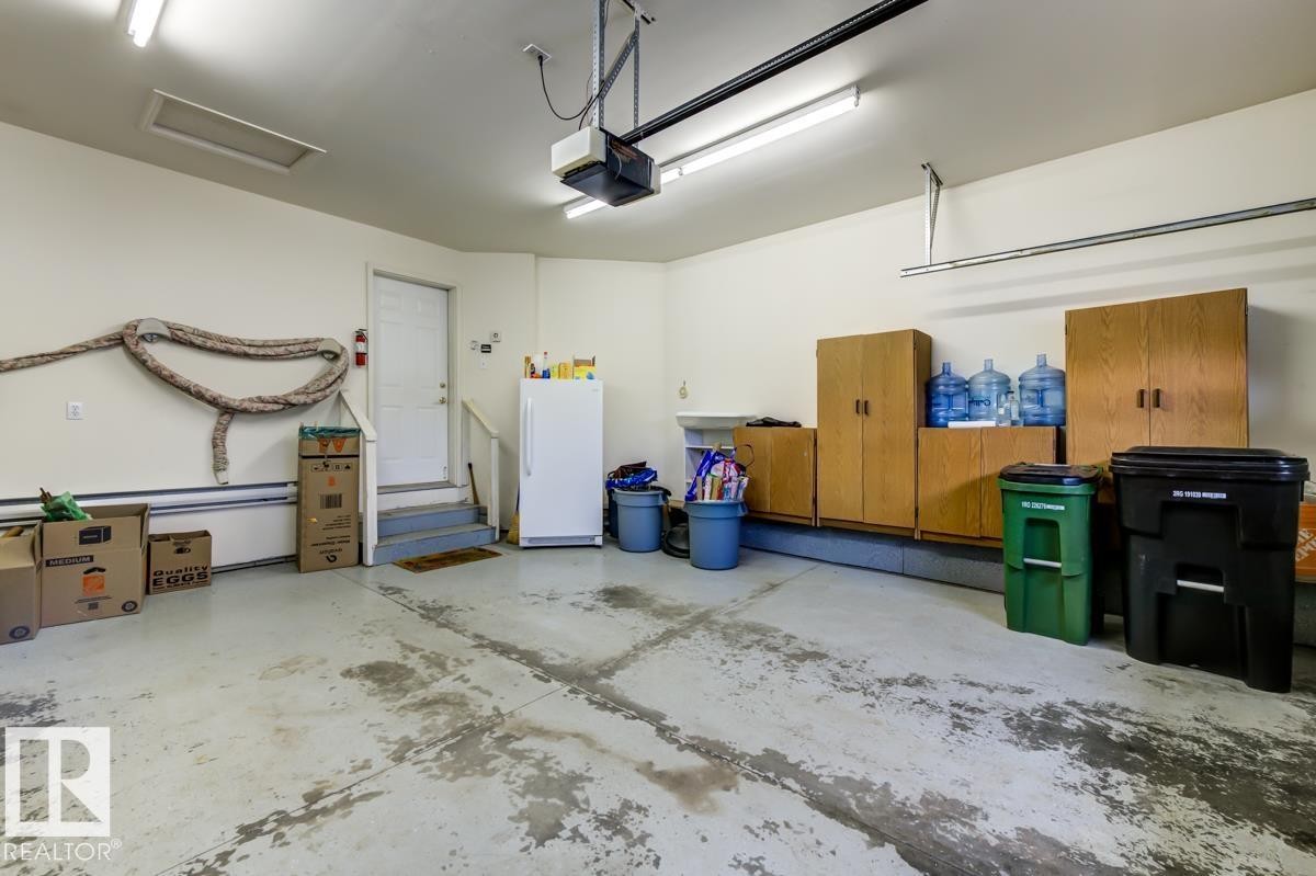 #7 9731 174 St Nw, Edmonton, AB - Indoor Photo Showing Garage