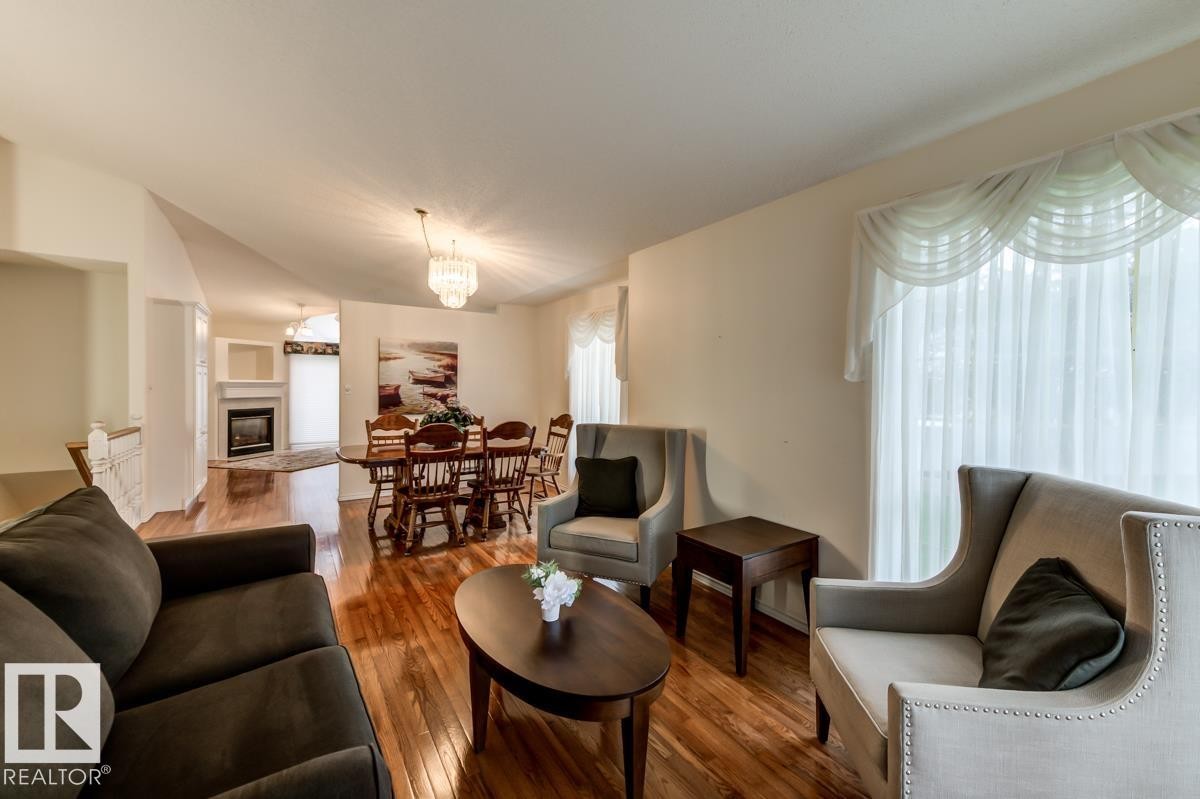 #7 9731 174 St Nw, Edmonton, AB - Indoor Photo Showing Living Room With Fireplace