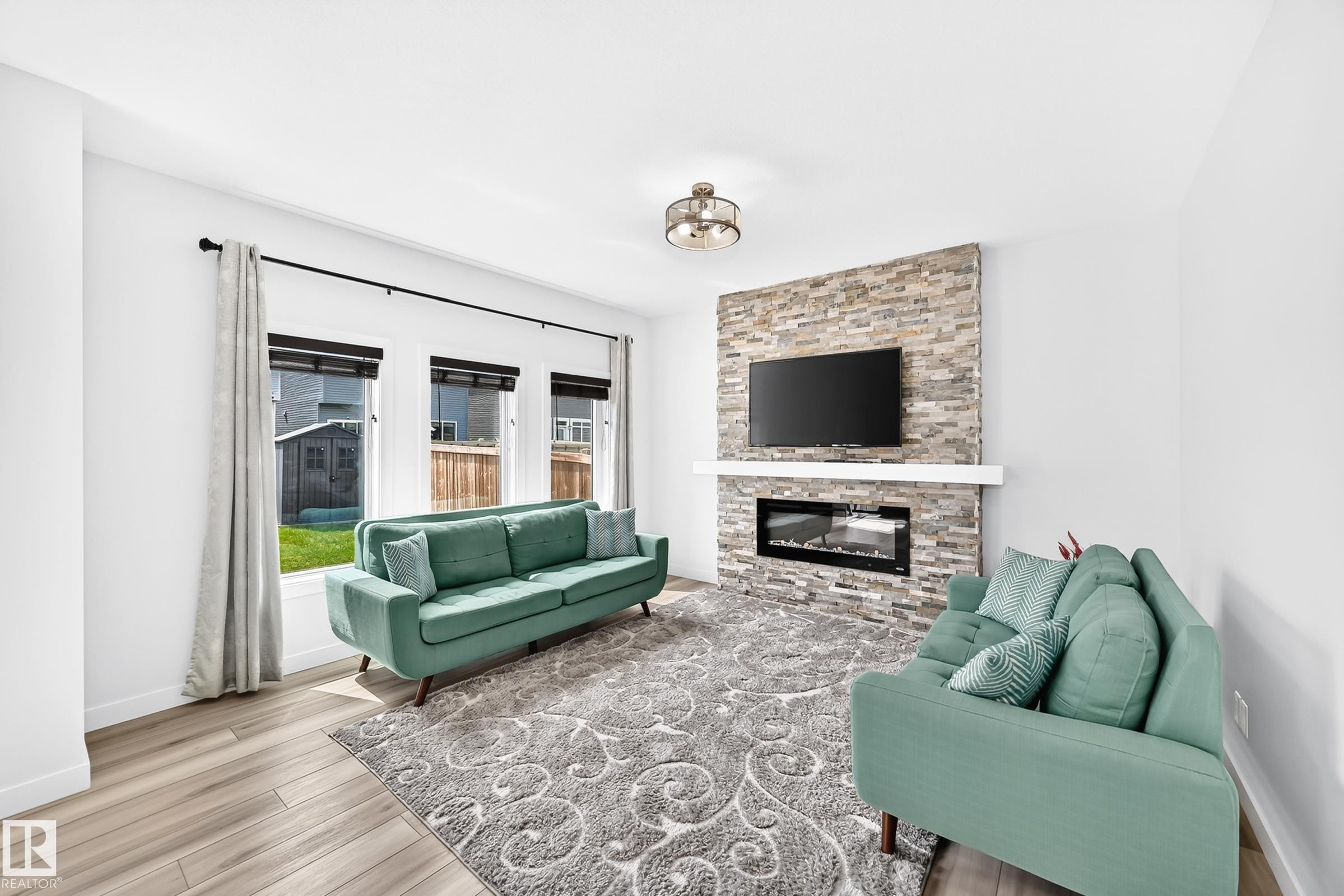 3751 Cross Landing Sw, Edmonton, AB - Indoor Photo Showing Living Room With Fireplace
