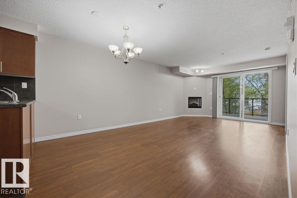 204 10118 106 Avenue, Edmonton, AB - Indoor With Fireplace