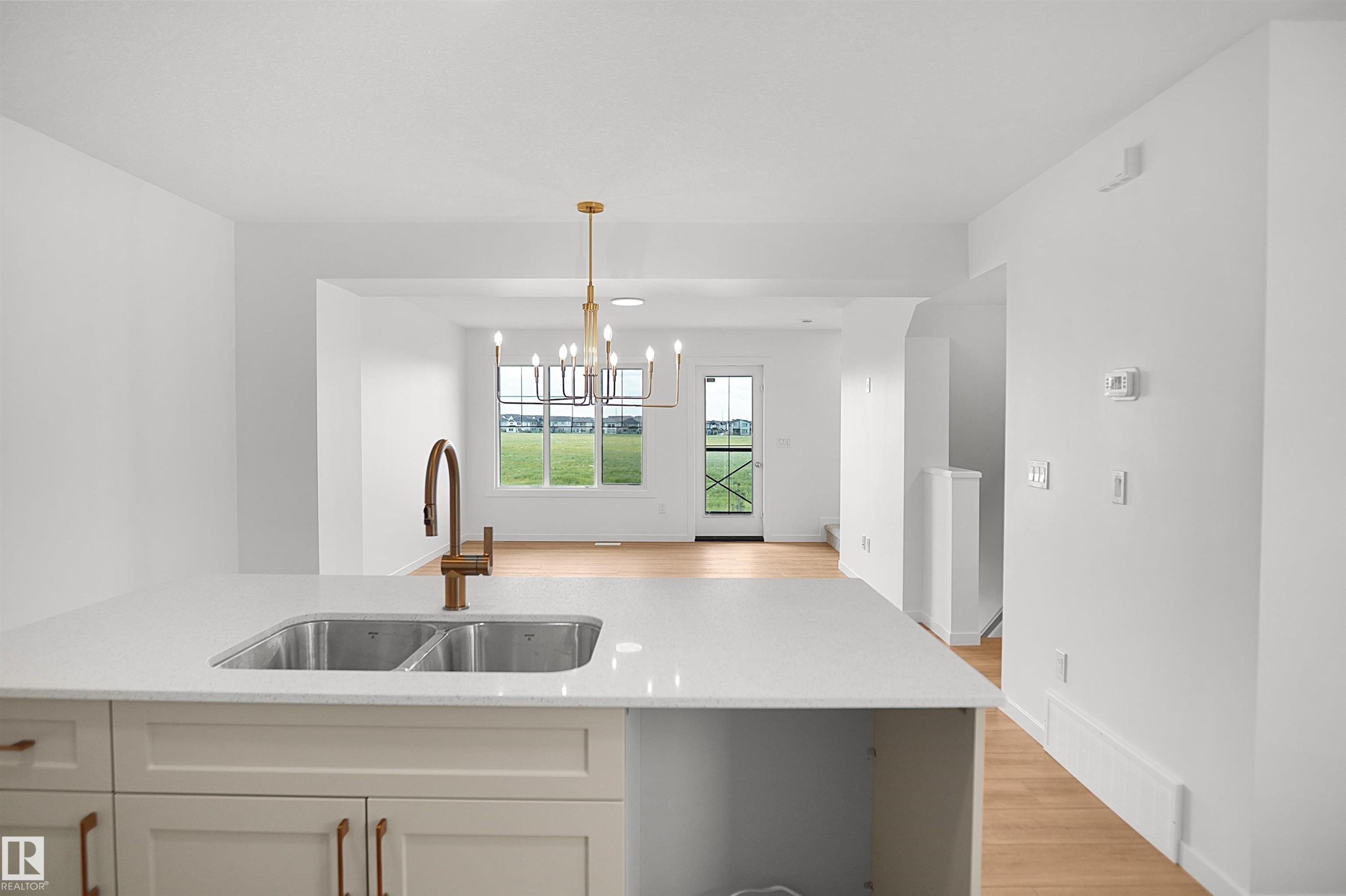 525 Aster Drive Nw, Edmonton, AB - Indoor Photo Showing Kitchen With Double Sink