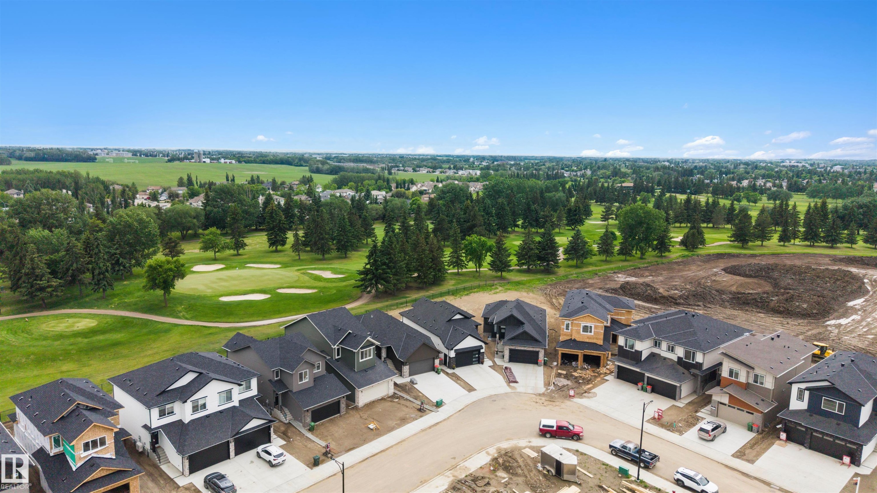 New construction residences with modern architectural designs and attached garages - 24 Grayson Green, Stony Plain, AB