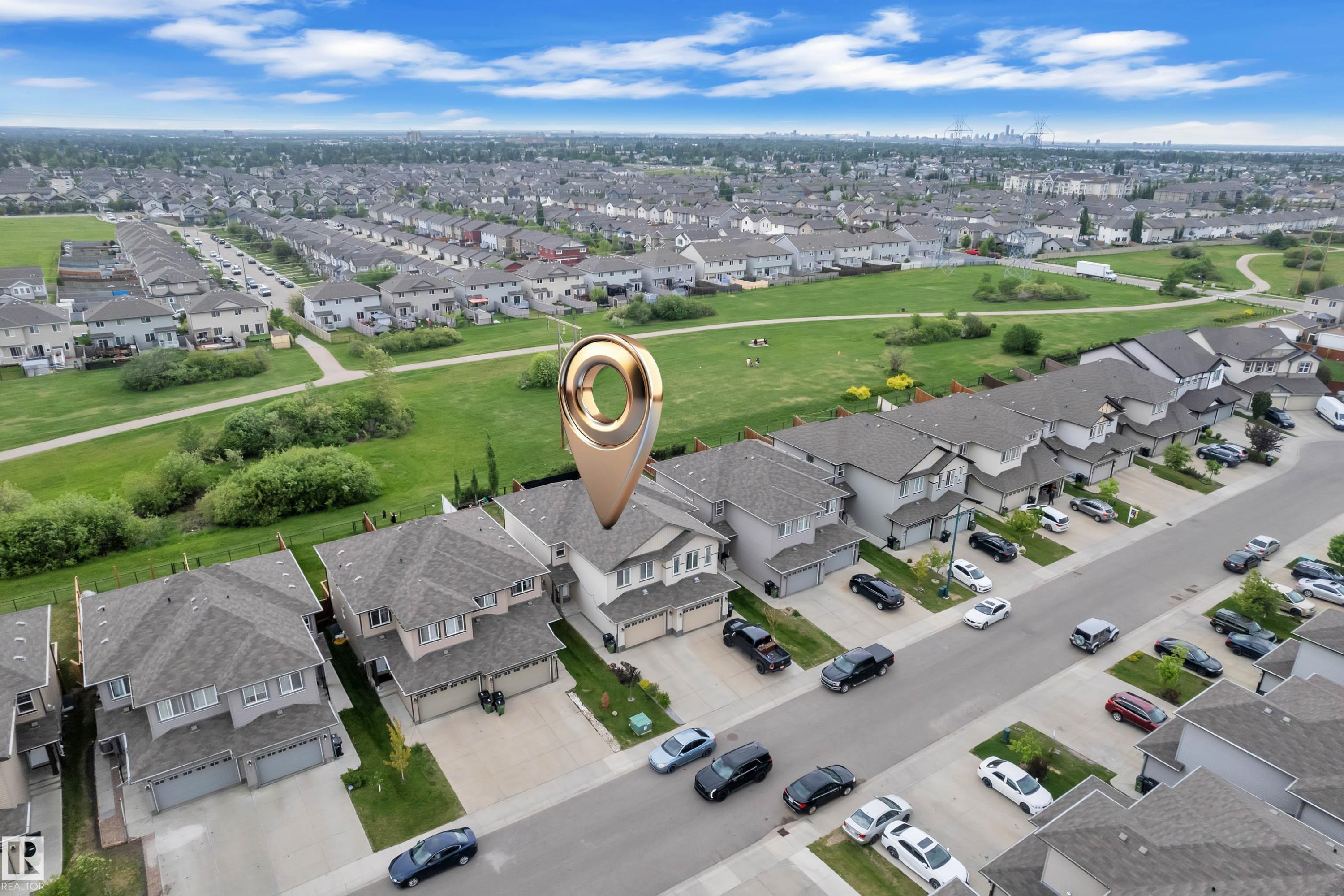 Aerial perspective showcasing a residential street with detached homes - 1750 27 Street, Edmonton, AB