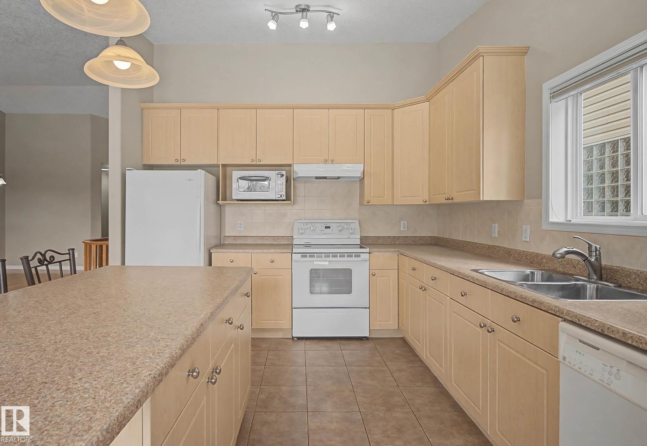 #6 2031 Brennan Cr Nw, Edmonton, AB - Indoor Photo Showing Kitchen With Double Sink