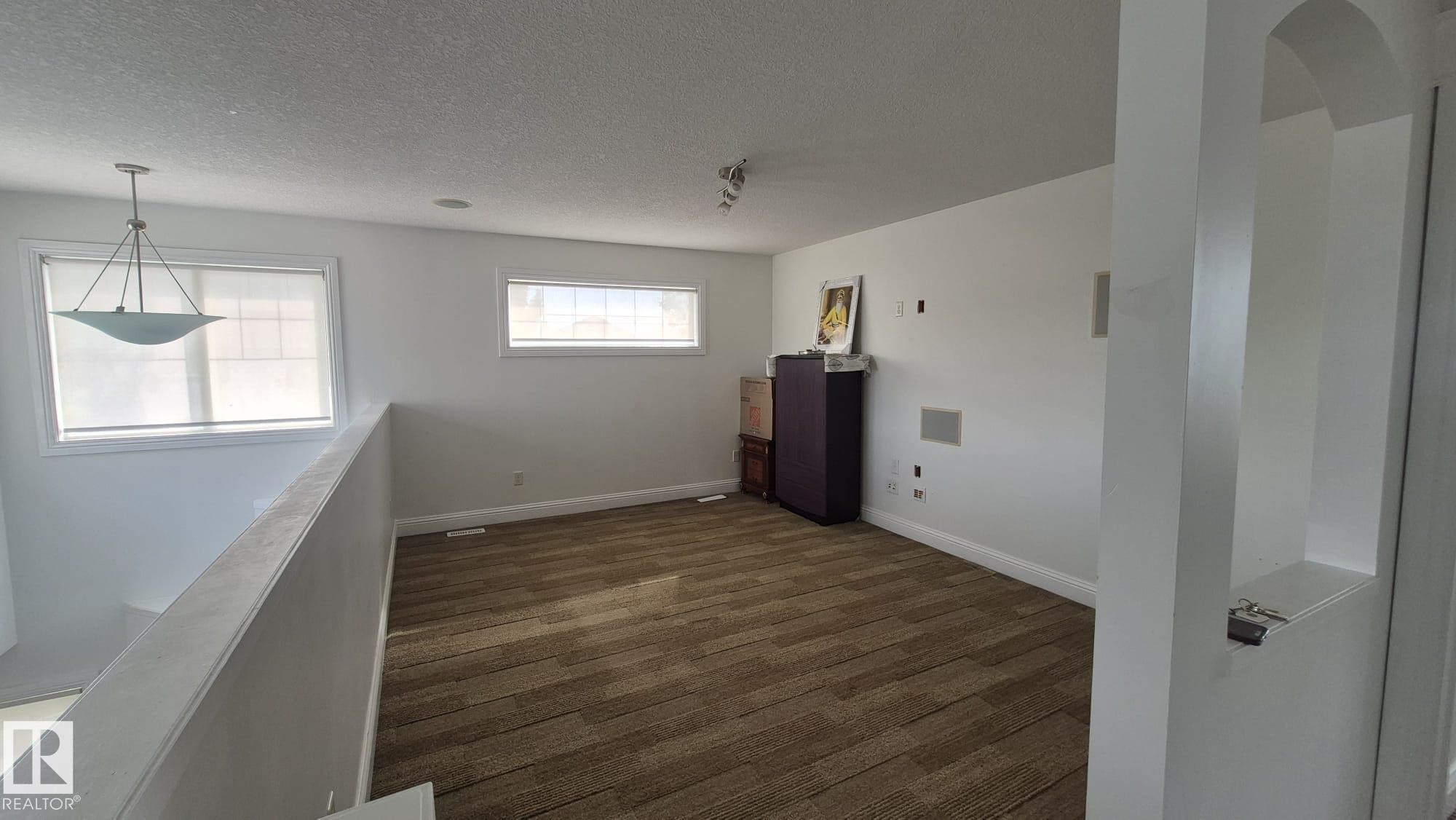 5440 1A Avenue, Edmonton, AB - Indoor Photo Showing Other Room