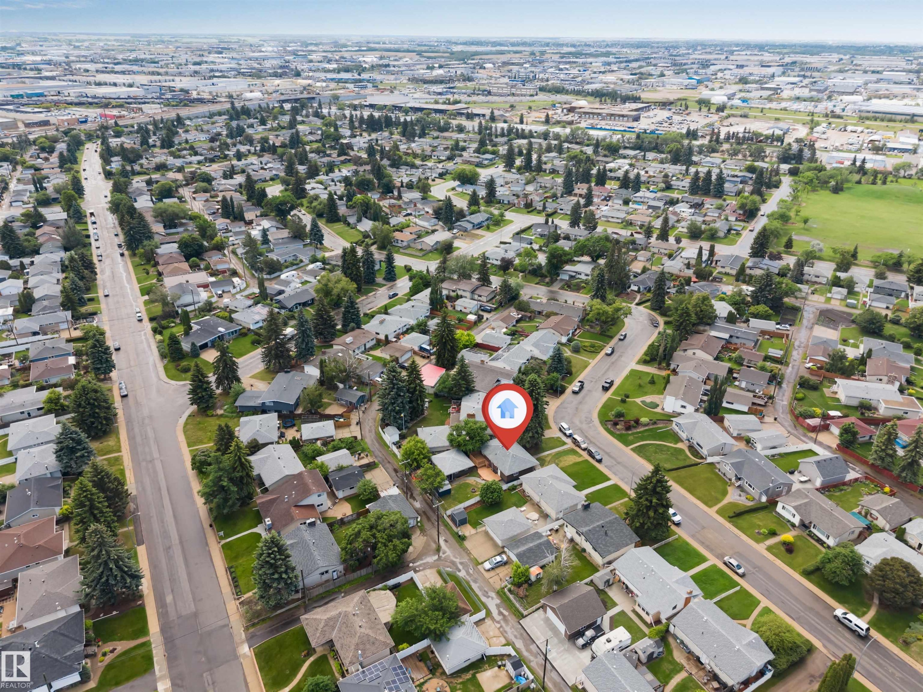 Aerial view of a residential neighborhood with established homes and mature trees - 6404 88 Avenue, Edmonton, AB