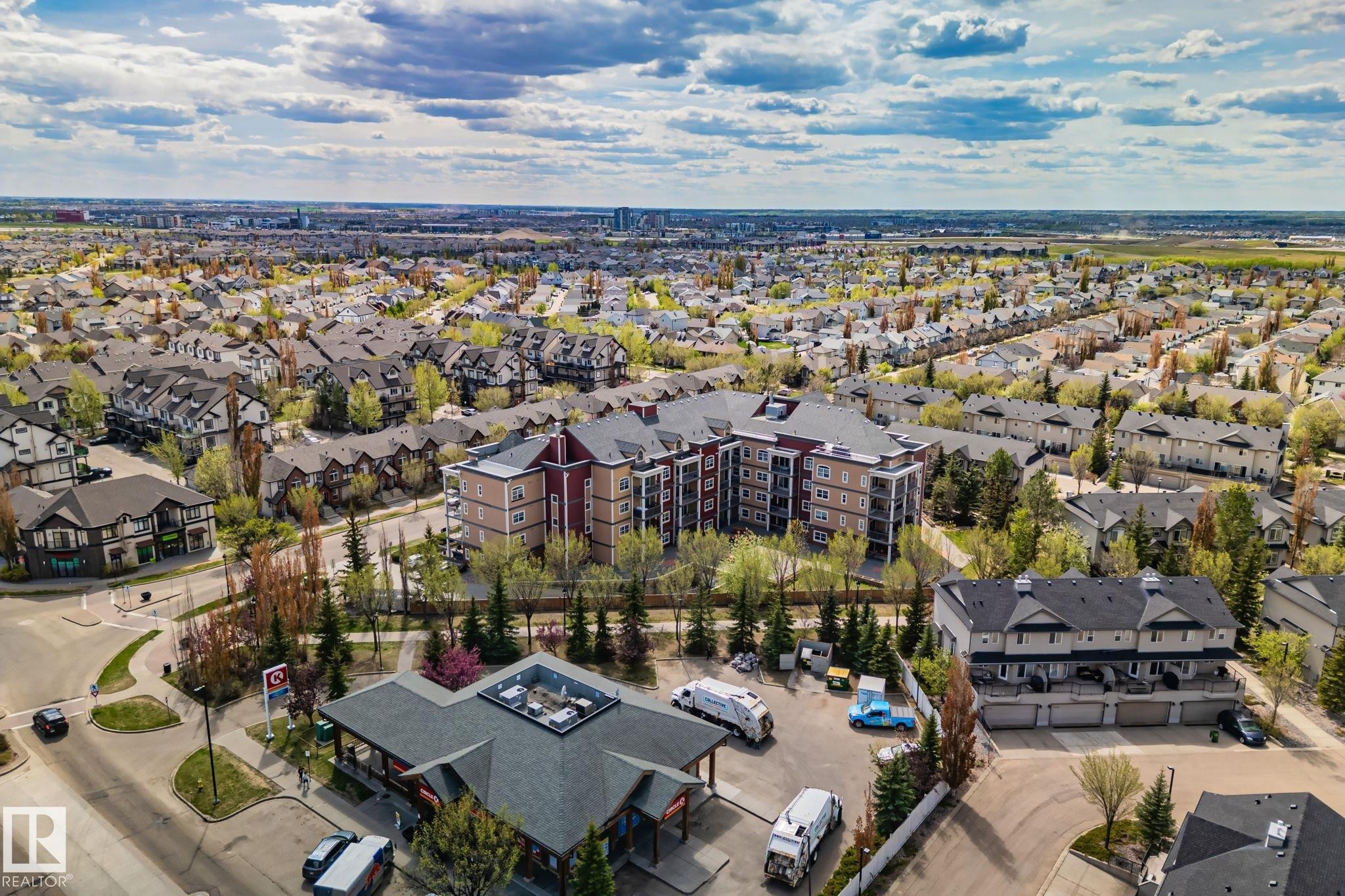 Expansive residential area featuring a diverse collection of single-family residences, townhomes, and a multi-story apartment building - 209 5280 Terwillegar Boulevard, Edmonton, AB - Outdoor With View