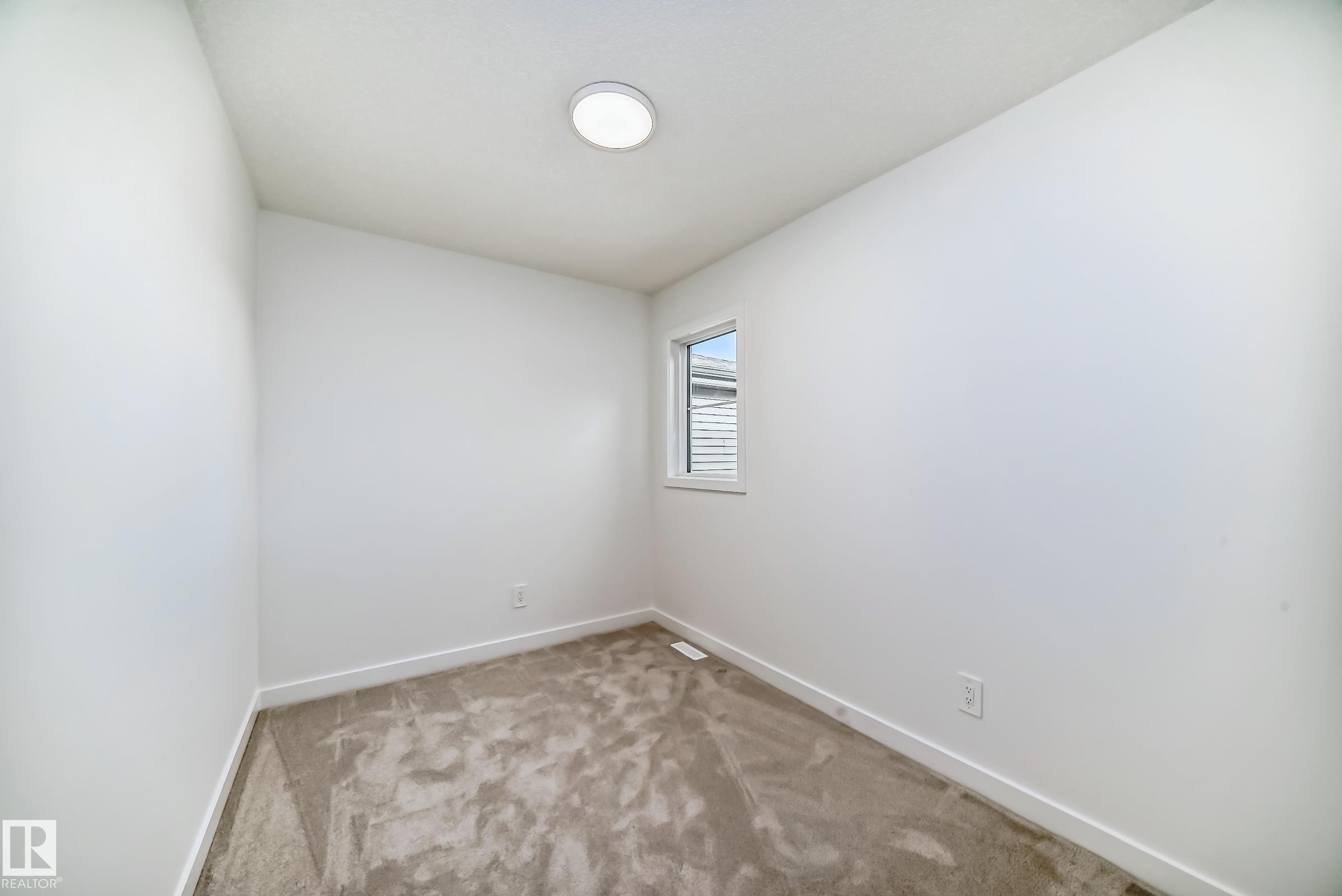 8255 Kiriak Loop Sw, Edmonton, AB - Indoor Photo Showing Other Room