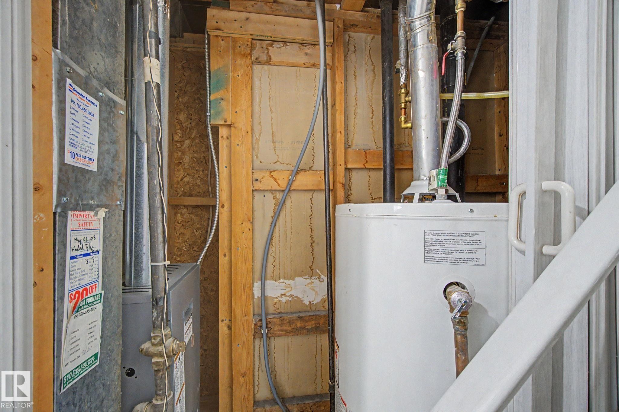 Utility closet featuring a water heater and furnace unit - 1511 75 Street, Edmonton, AB