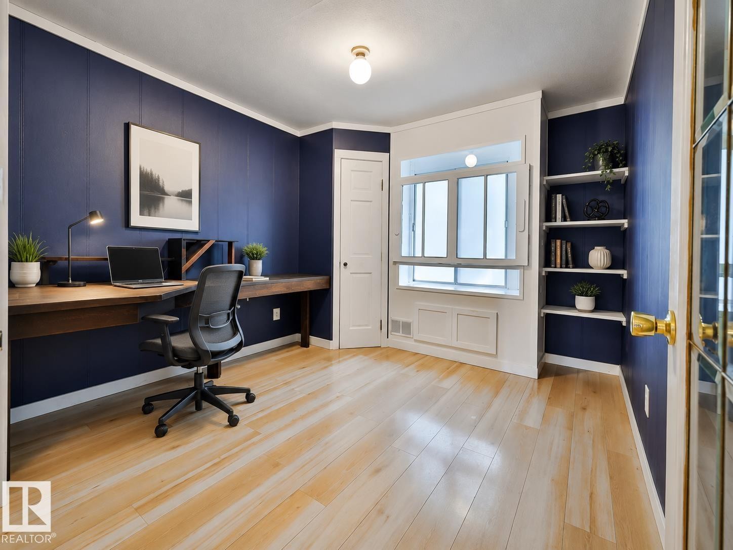 Bright interior space featuring light wood flooring - 8318 80 Avenue, Edmonton, AB