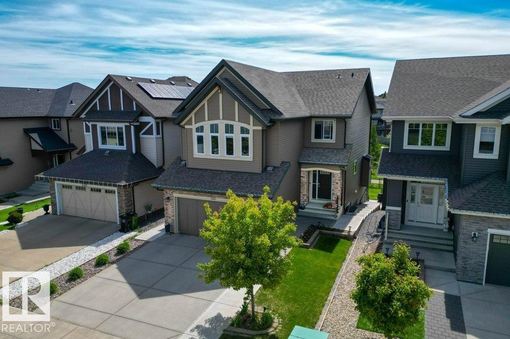 Modern two-story residence with a stone and siding exterior - 5315 20 Avenue Sw, Edmonton, AB