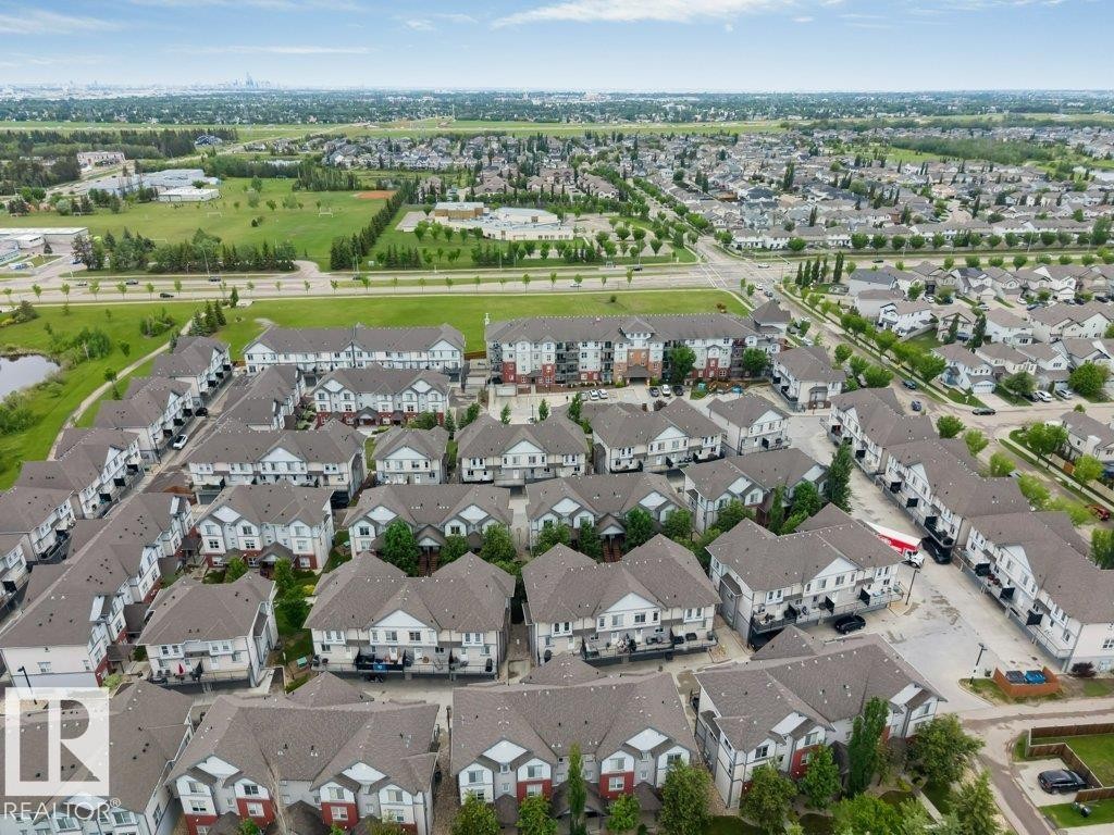 Expansive community featuring multi-unit residential buildings - 401 667 Watt Boulevard, Edmonton, AB
