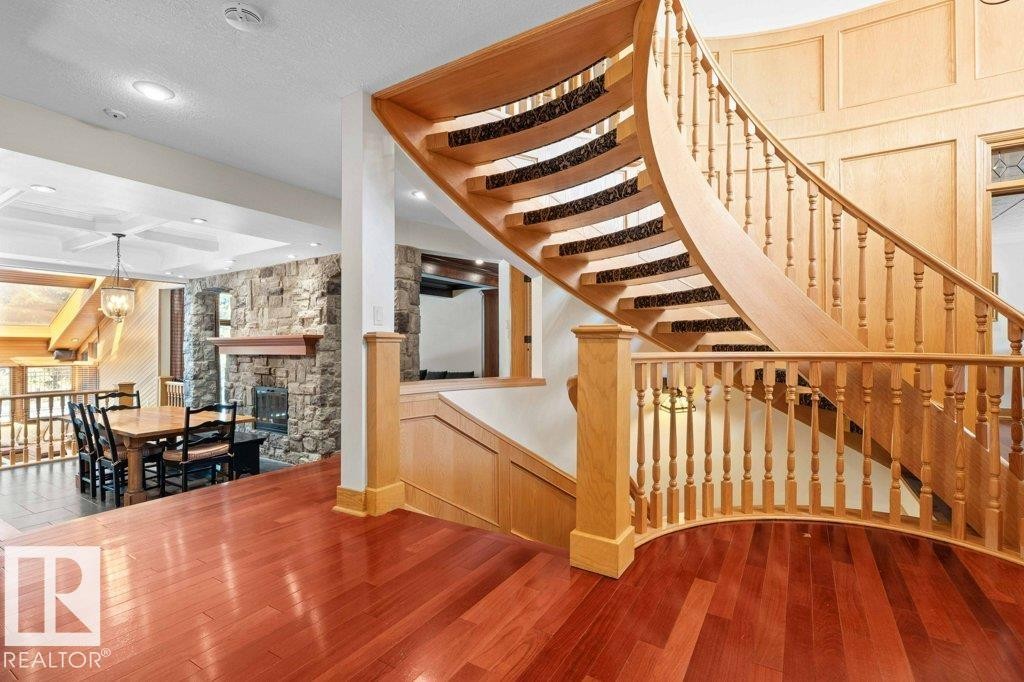Spacious foyer with view to kitchen and sunroom with skylights. - 738 Wheeler Road, Edmonton, AB