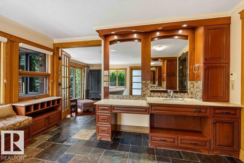 Master ensuite with heated slate flooring, steam shower, Grohe taps throughout, hydronic heated towel bar and air jetted tub. - 738 Wheeler Road, Edmonton, AB