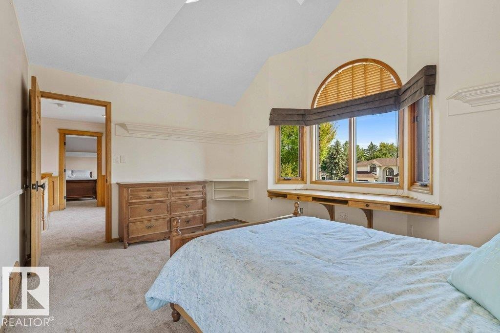 Bedroom with light colored carpet and high vaulted ceiling - 738 Wheeler Road, Edmonton, AB