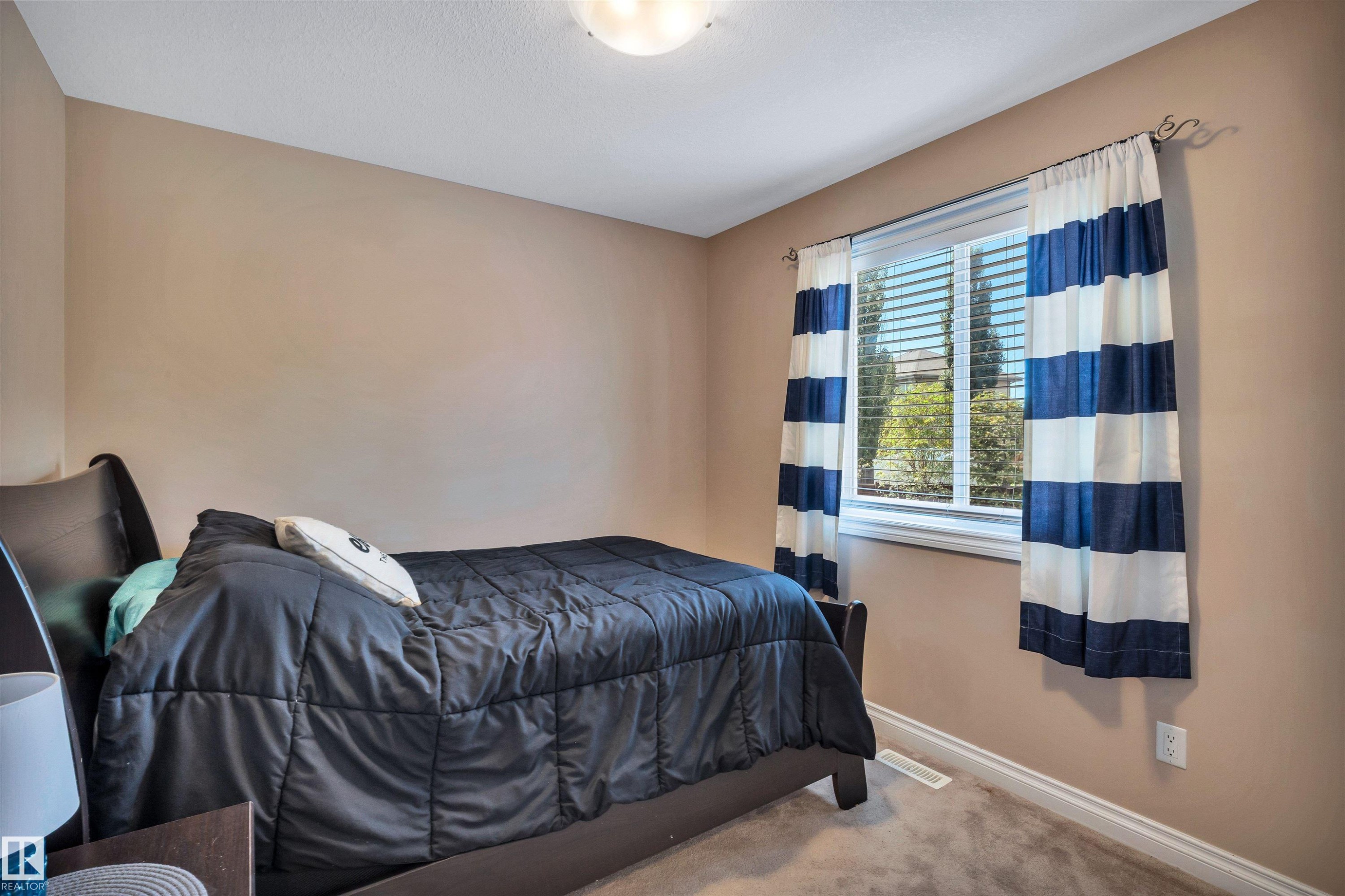 Room featuring carpeted flooring and neutral wall tones - 18 Voleta Crest, Spruce Grove, AB