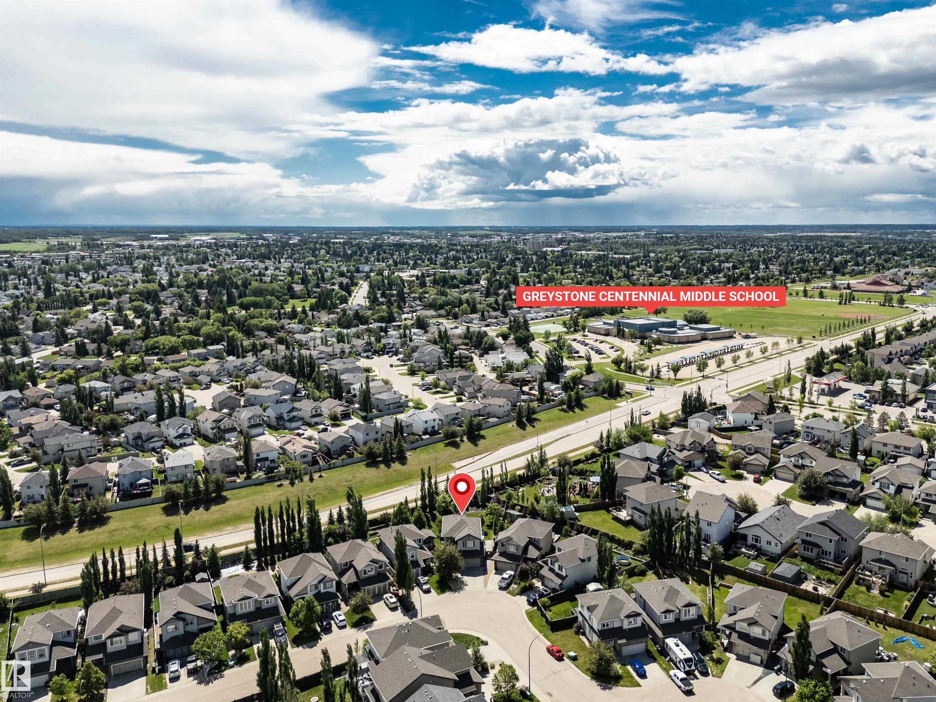 Aerial perspective showcasing a residential area with varied housing styles - 18 Voleta Crest, Spruce Grove, AB