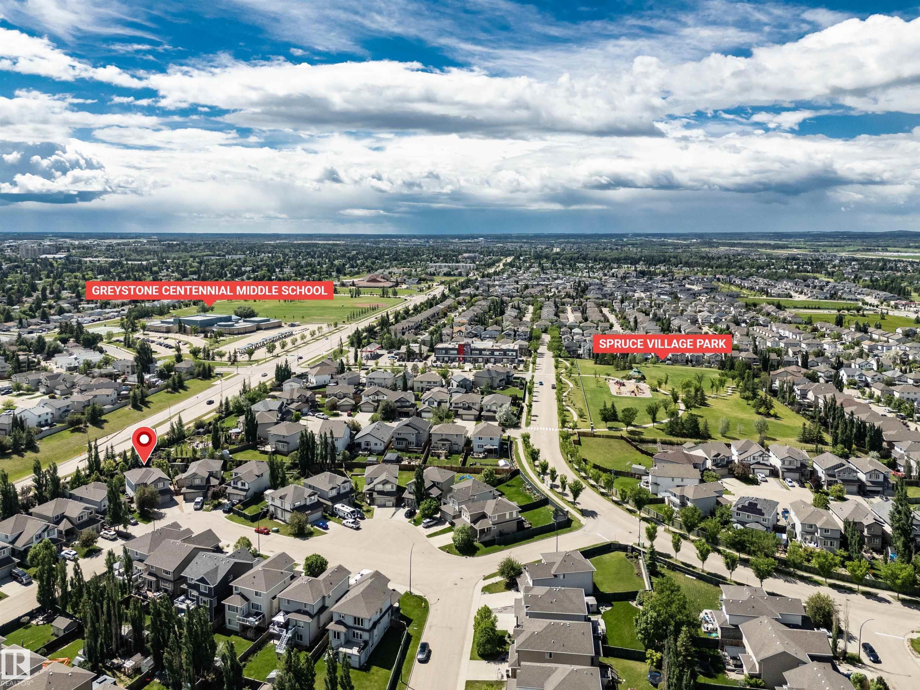 Aerial perspective showcasing a residential area with varied housing styles - 18 Voleta Crest, Spruce Grove, AB